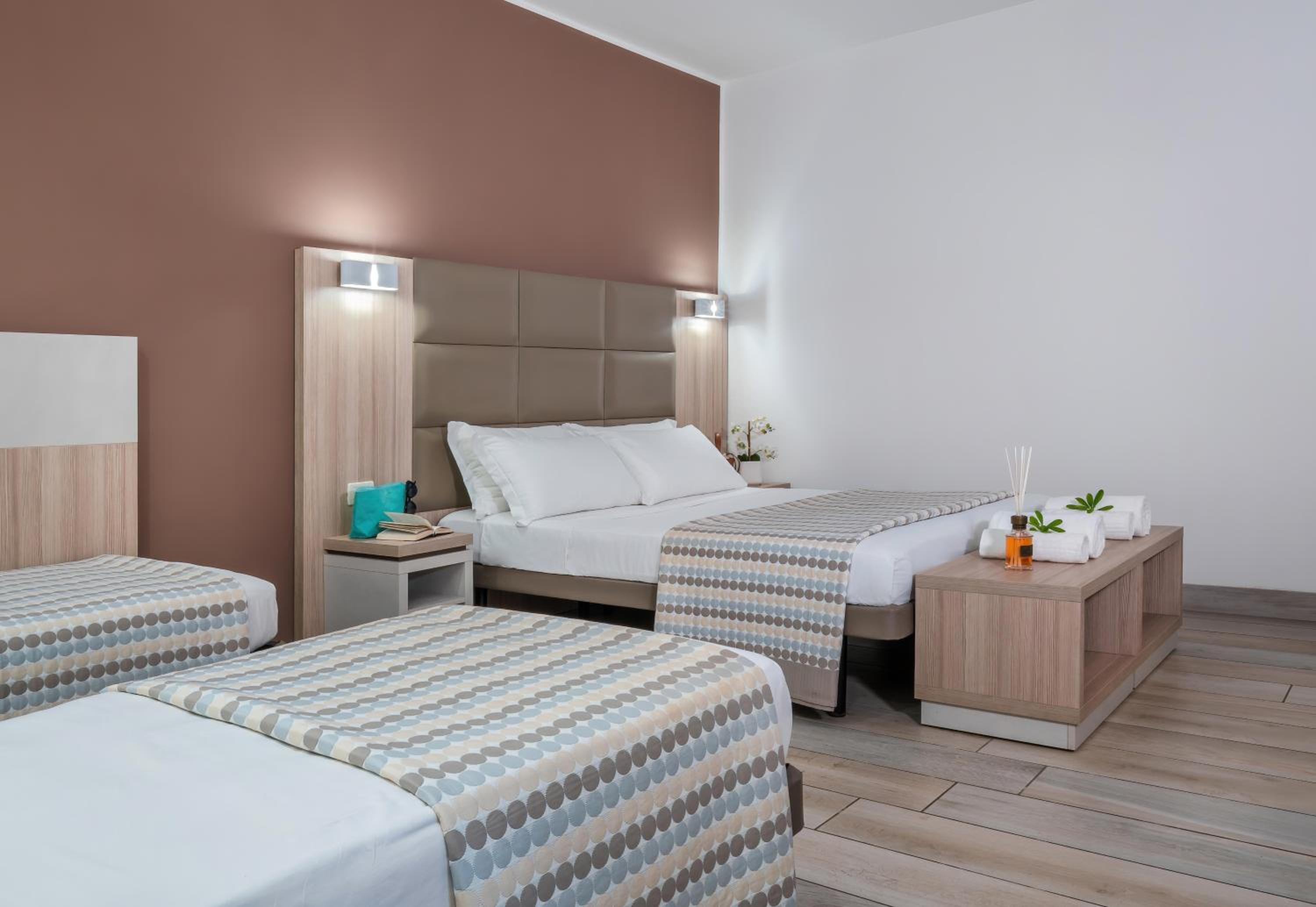 Quadruple Room (2 Adults + 2 Children) photo 3