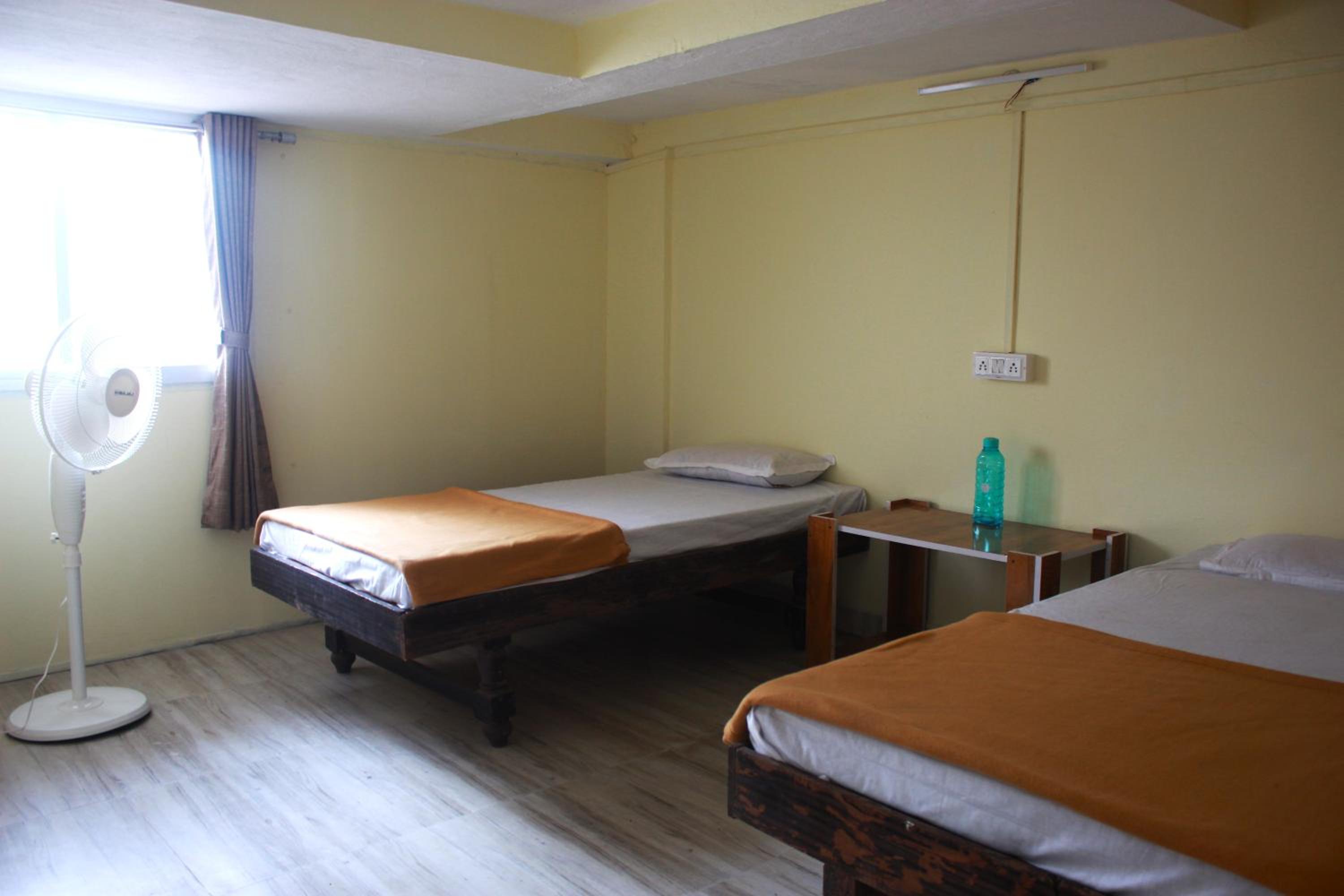 Single Bed In Male Dormitory Room With Shared Bathroom photo 2