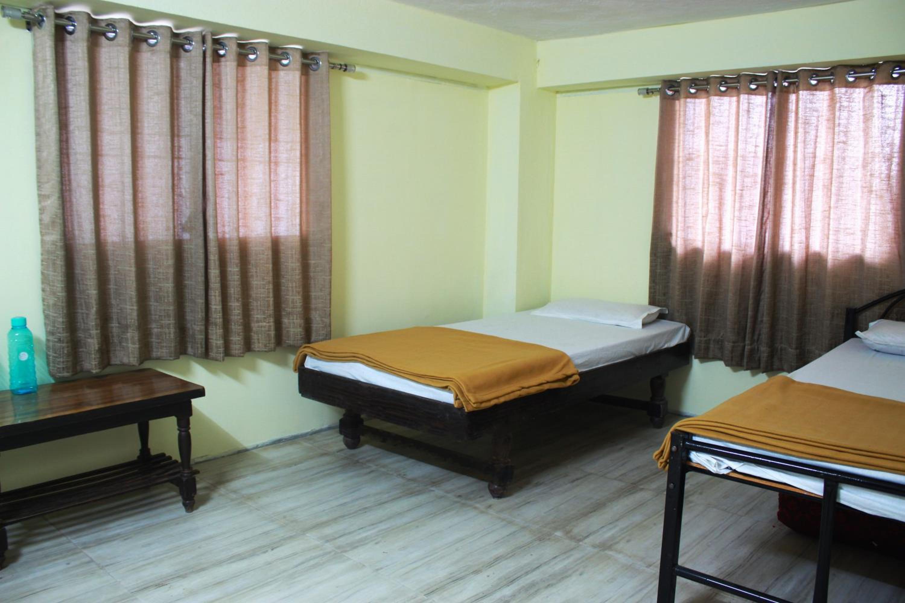 Single Bed In Male Dormitory Room With Shared Bathroom photo 1