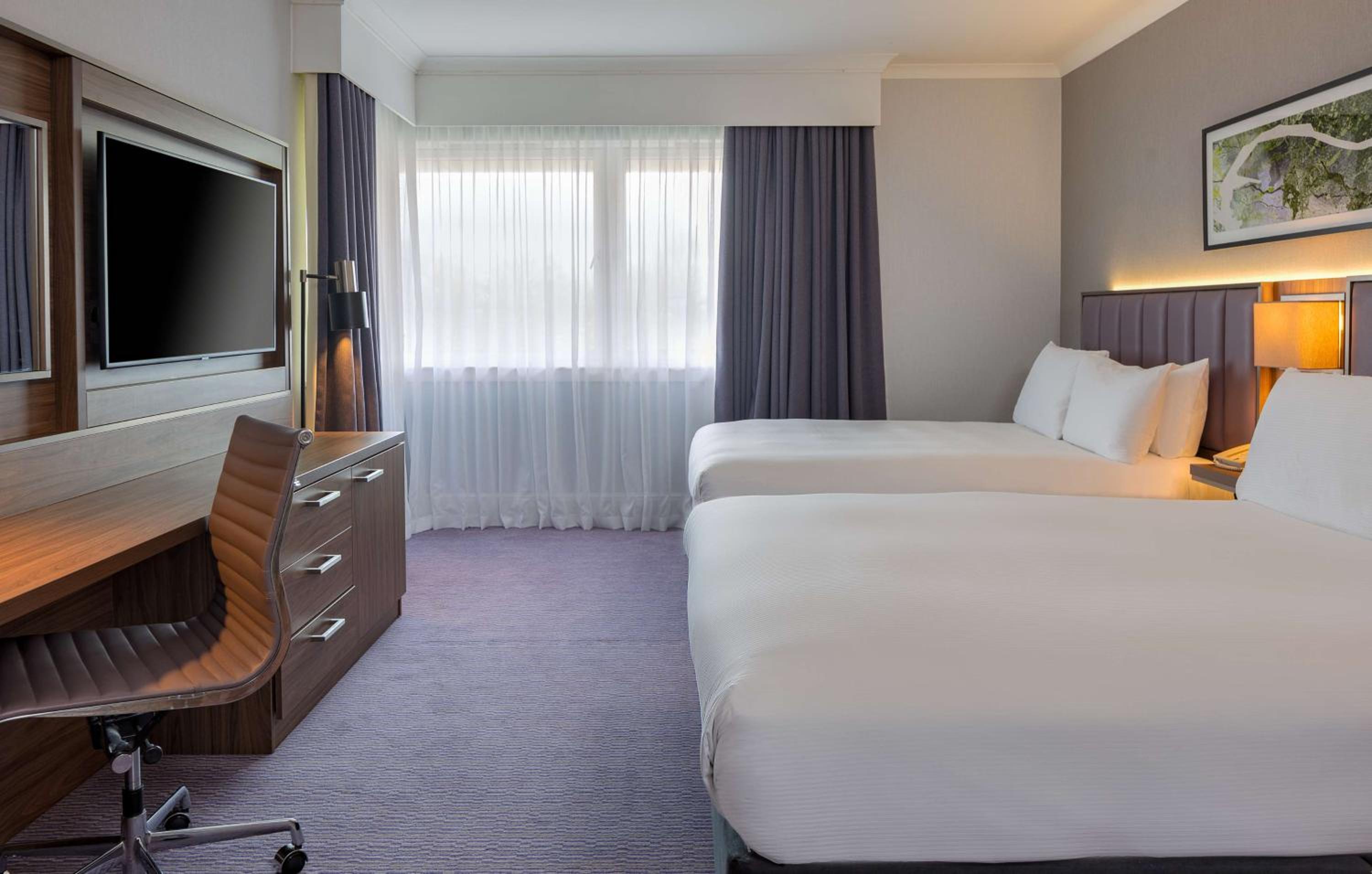 Standard Room with Two Queen Beds and Sofa Bed
