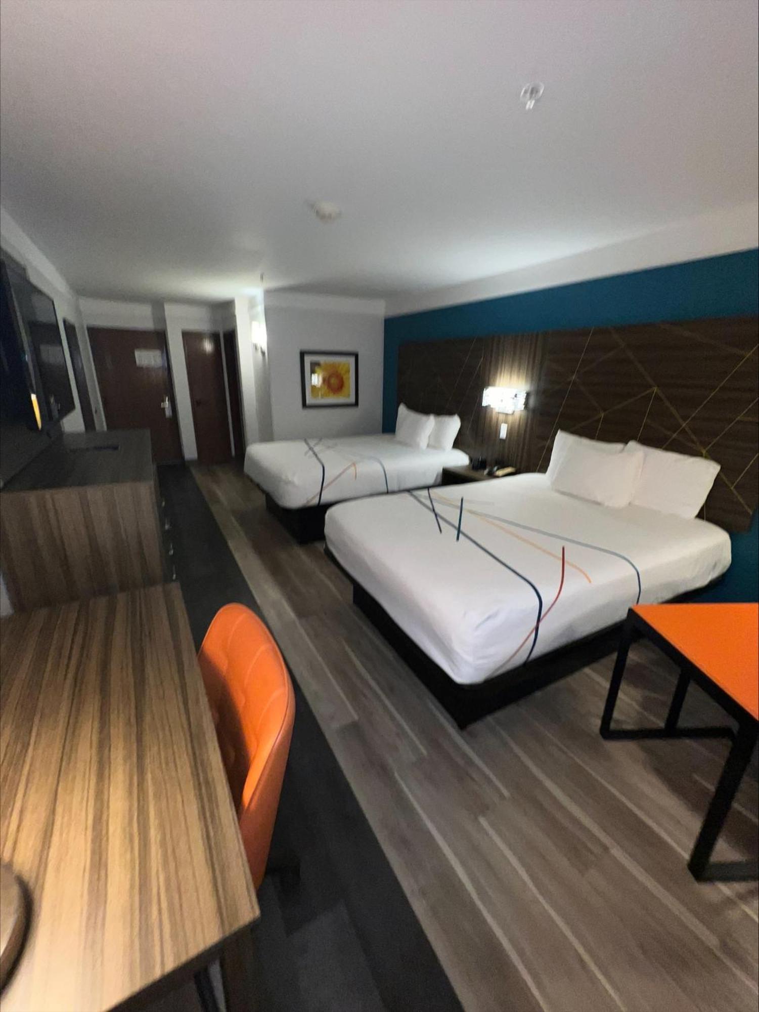 Queen Room with Two Queen Beds - Photo 1