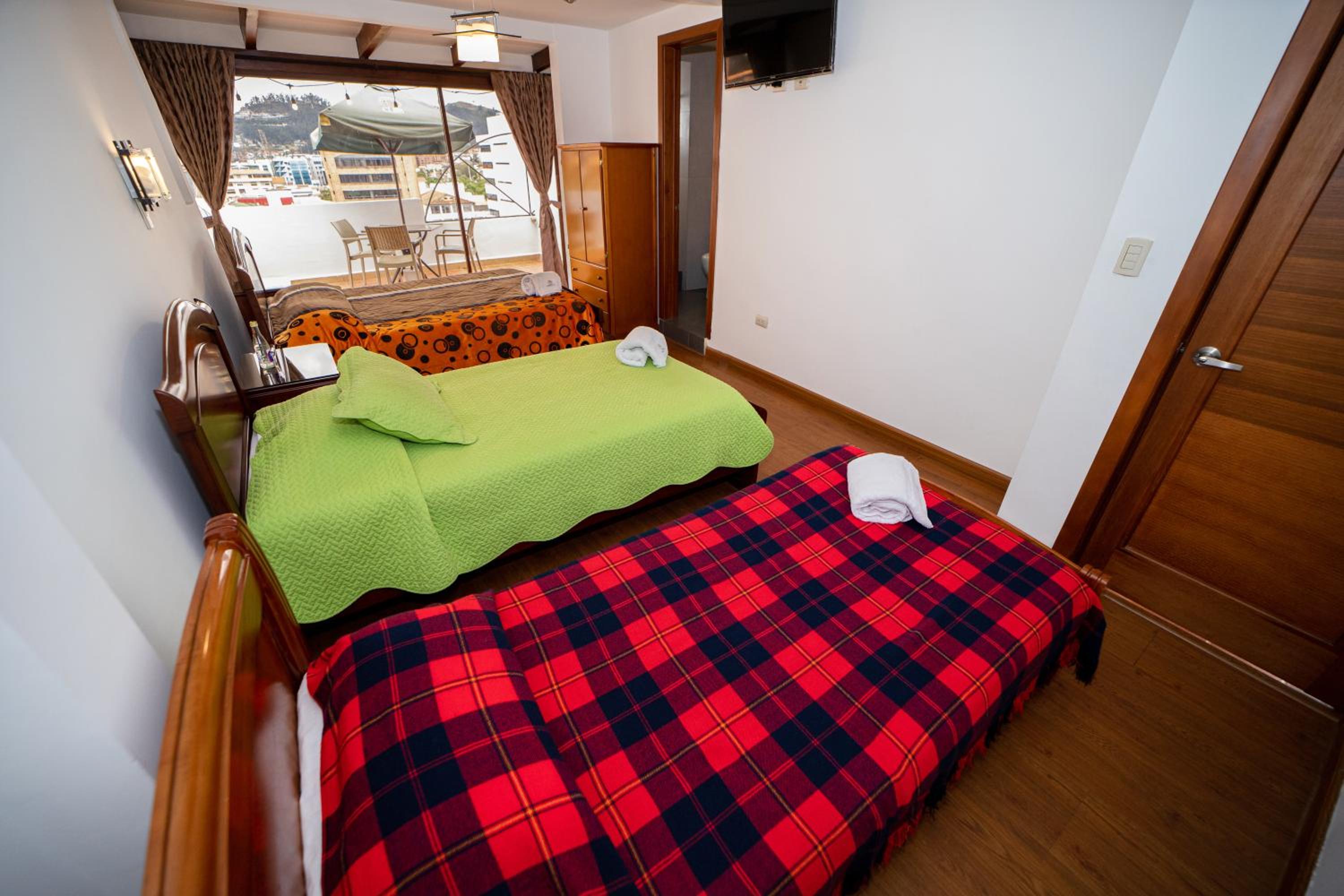 Quadruple Room with Balcony photo 3