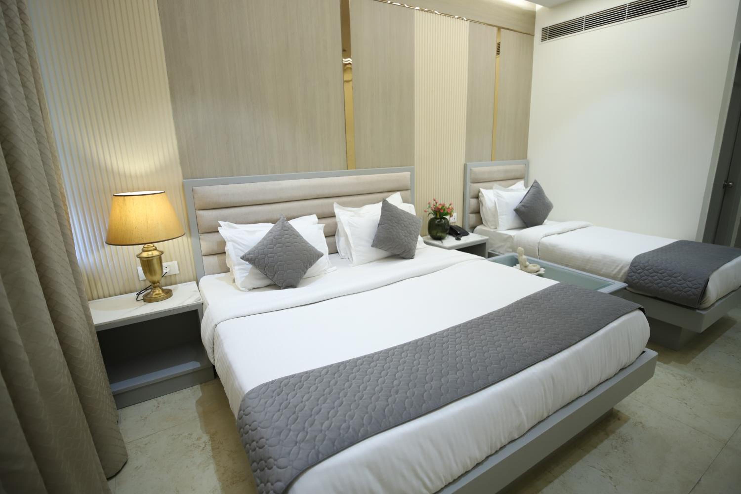 Deluxe Triple Room - Photo 7