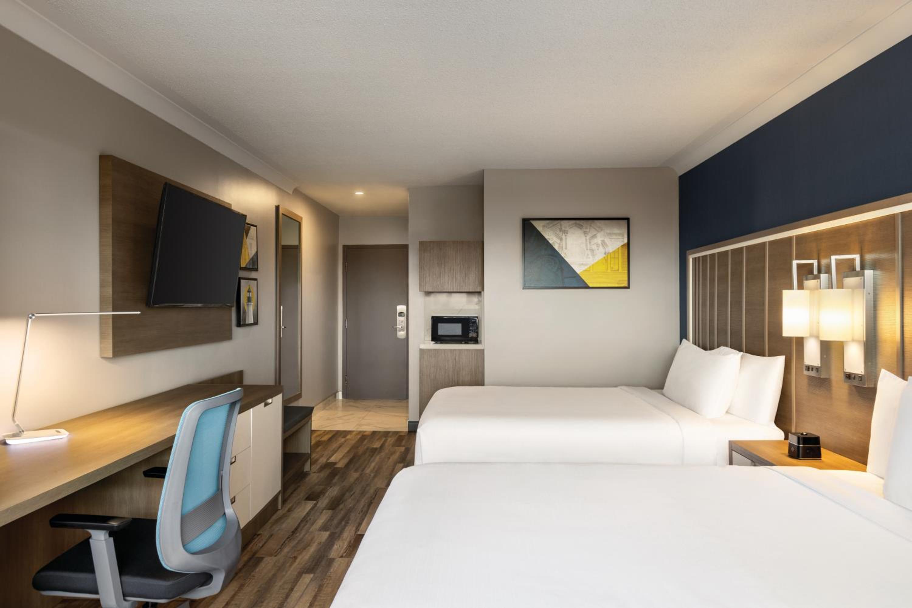 Standard Queen Room with Two Queen Beds and Bath/Shower - Photo 1