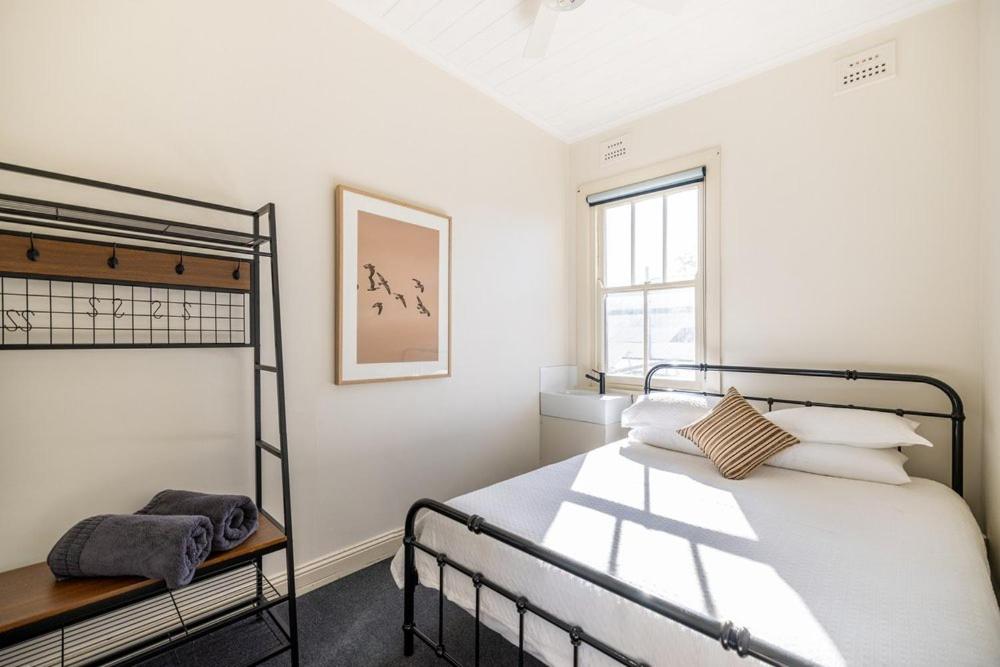 Queen Room with Shared Bathroom
