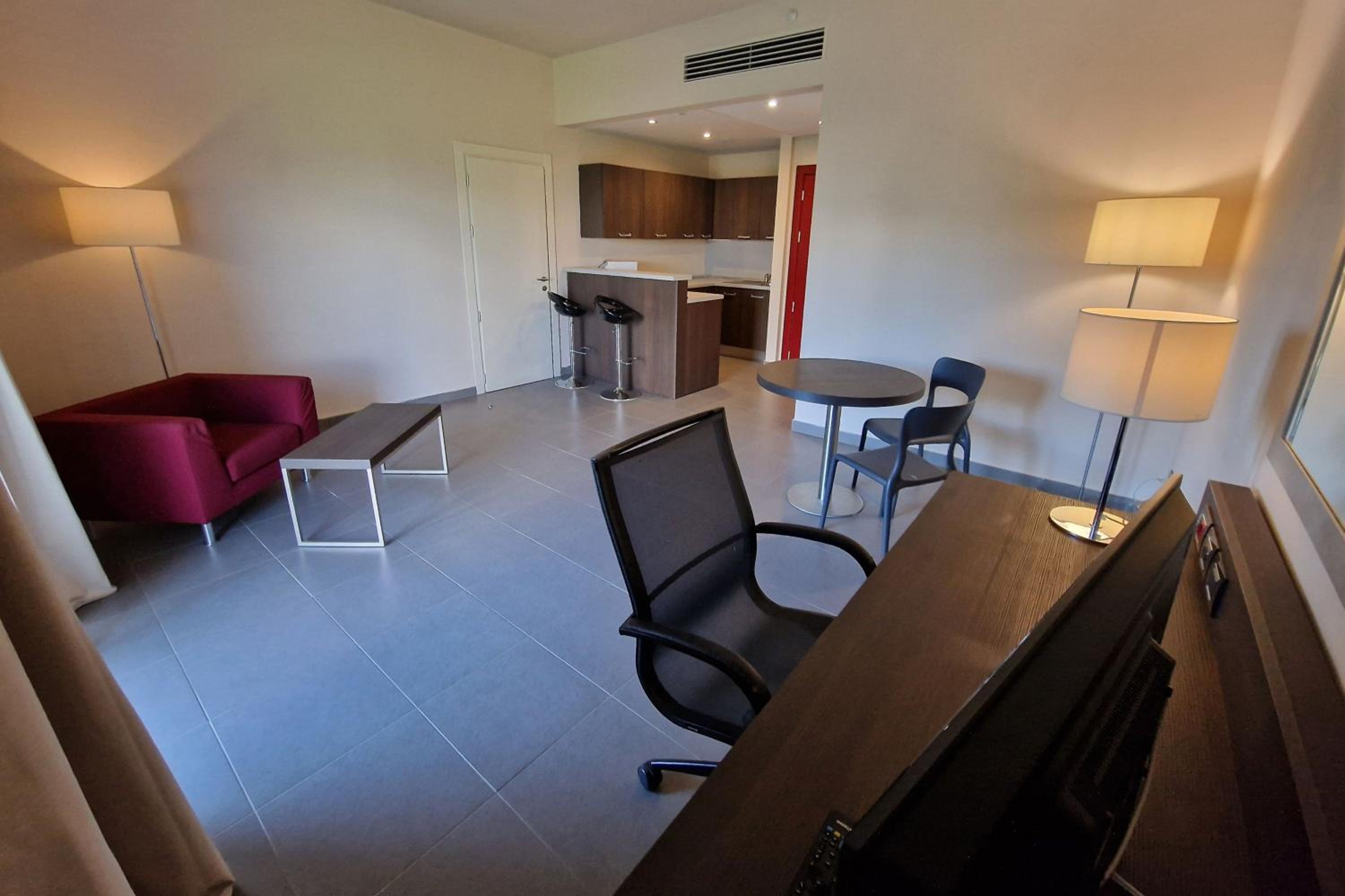 One-Bedroom King Suite with Balcony and Sofa Bed photo 1