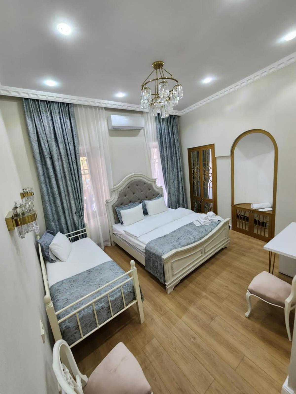 Deluxe Triple Room