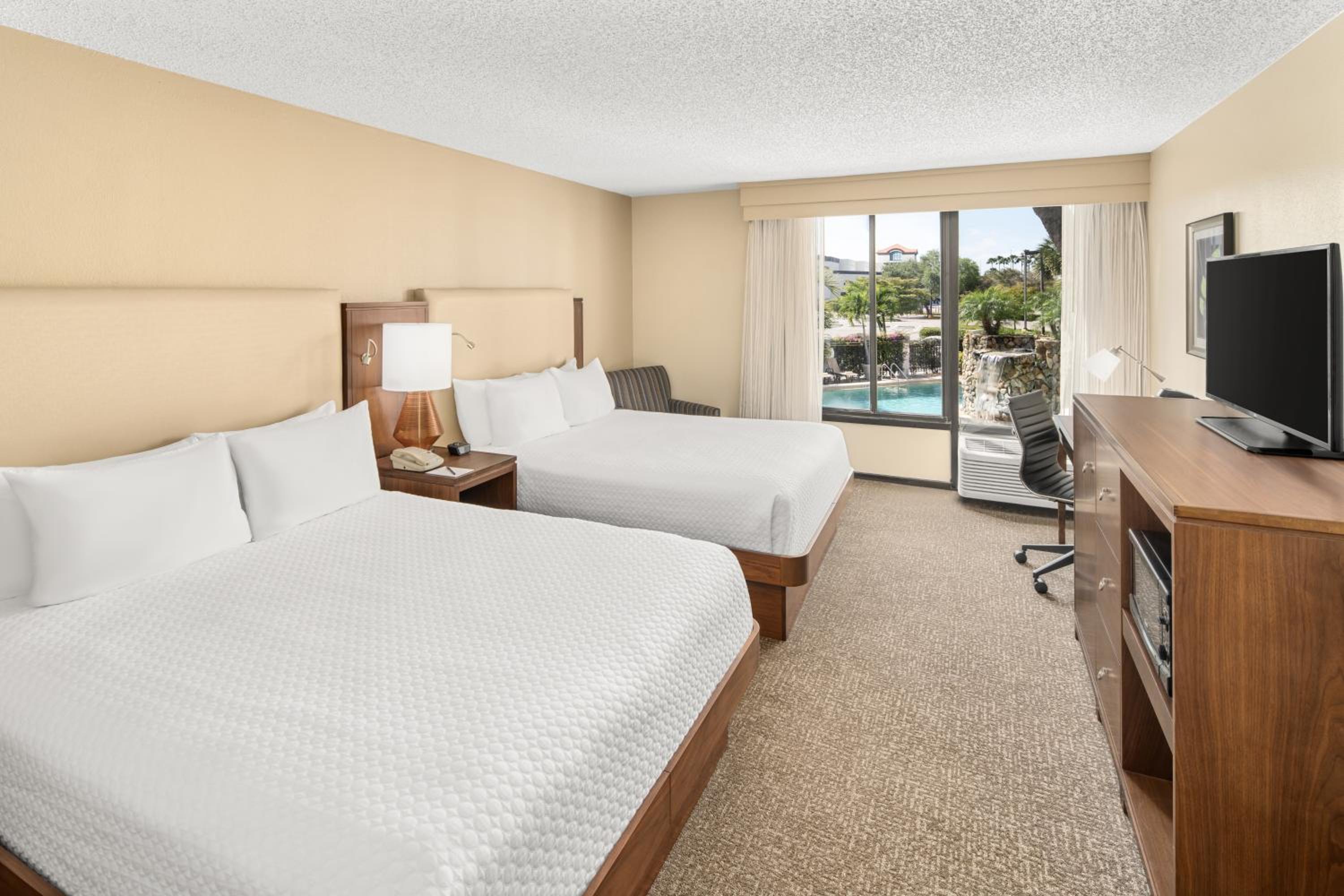 Queen Room with Two Queen Beds and Pool View - Photo 2