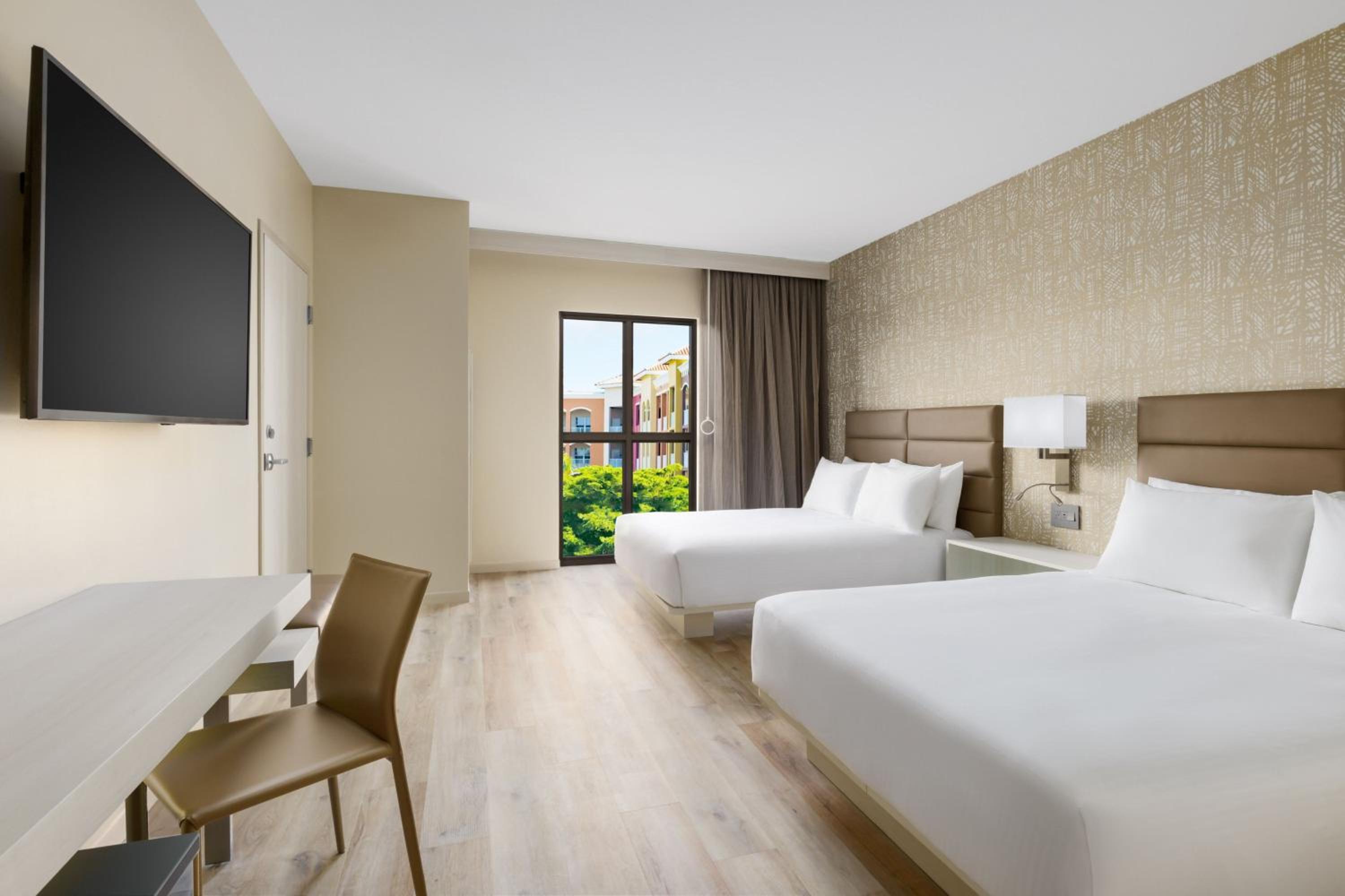 Standard Queen Room with Two Queen Beds - Photo 1