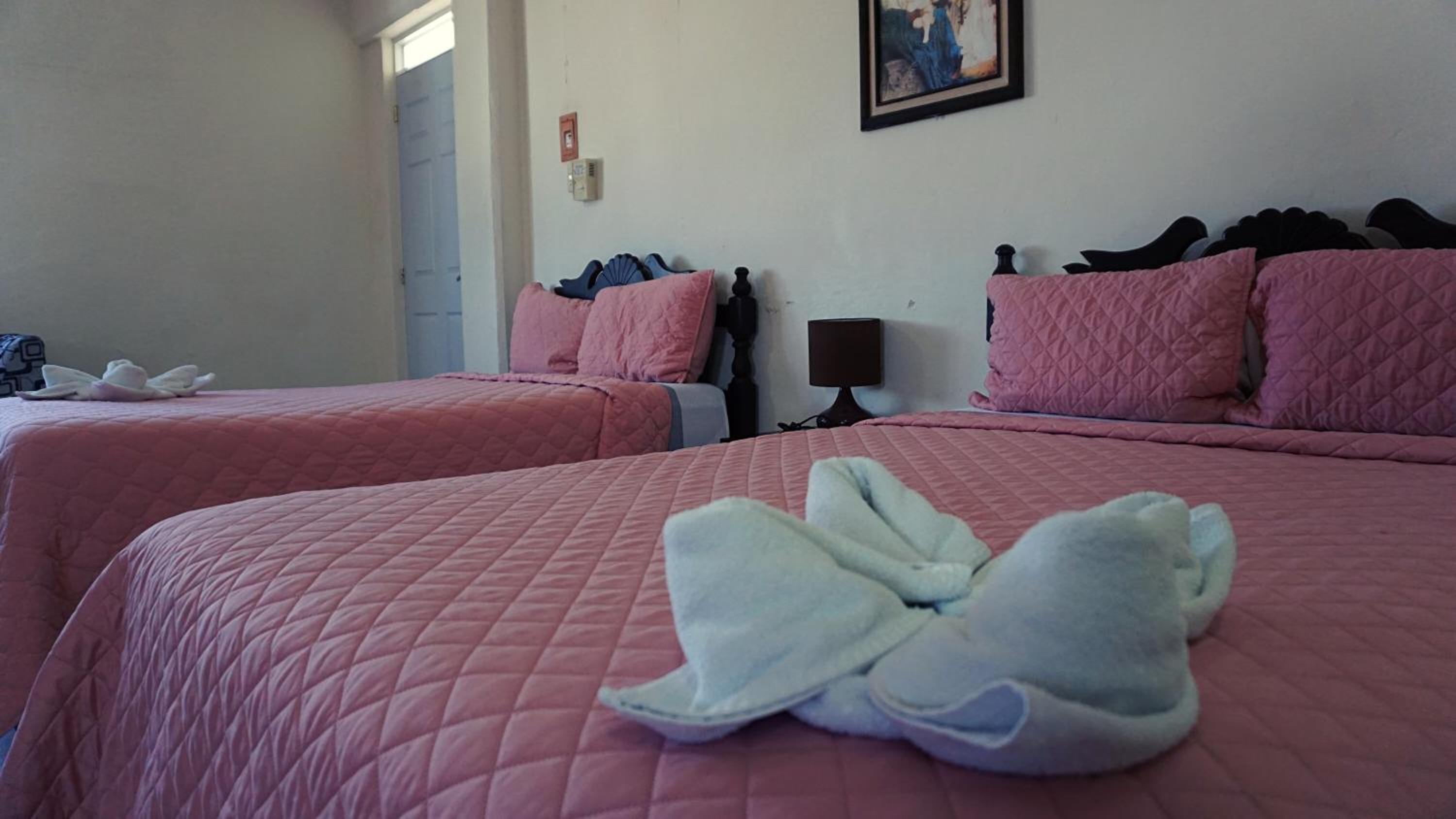 Quadruple Room with Balcony - Photo 9