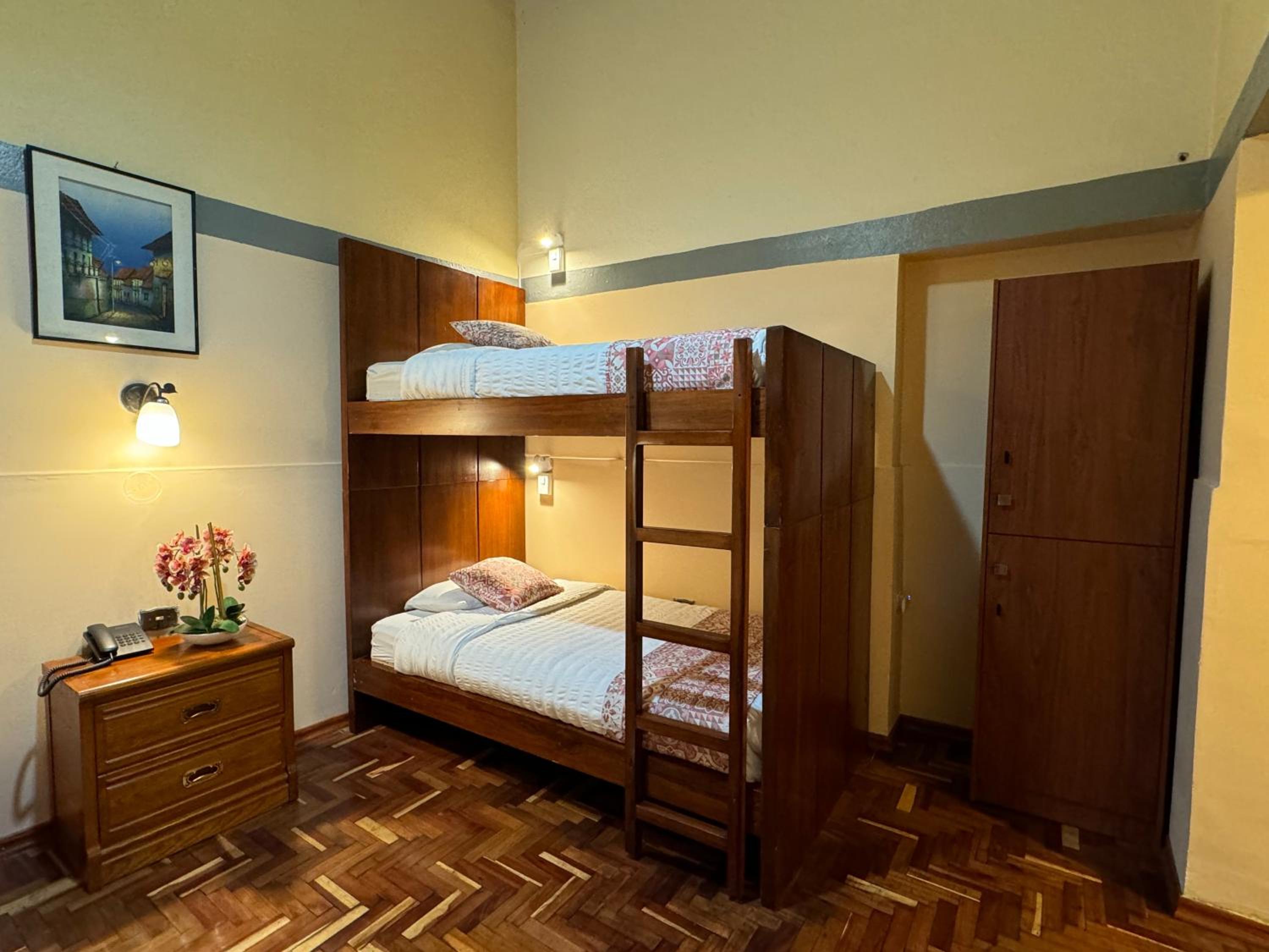 Single Bed in Dormitory Room