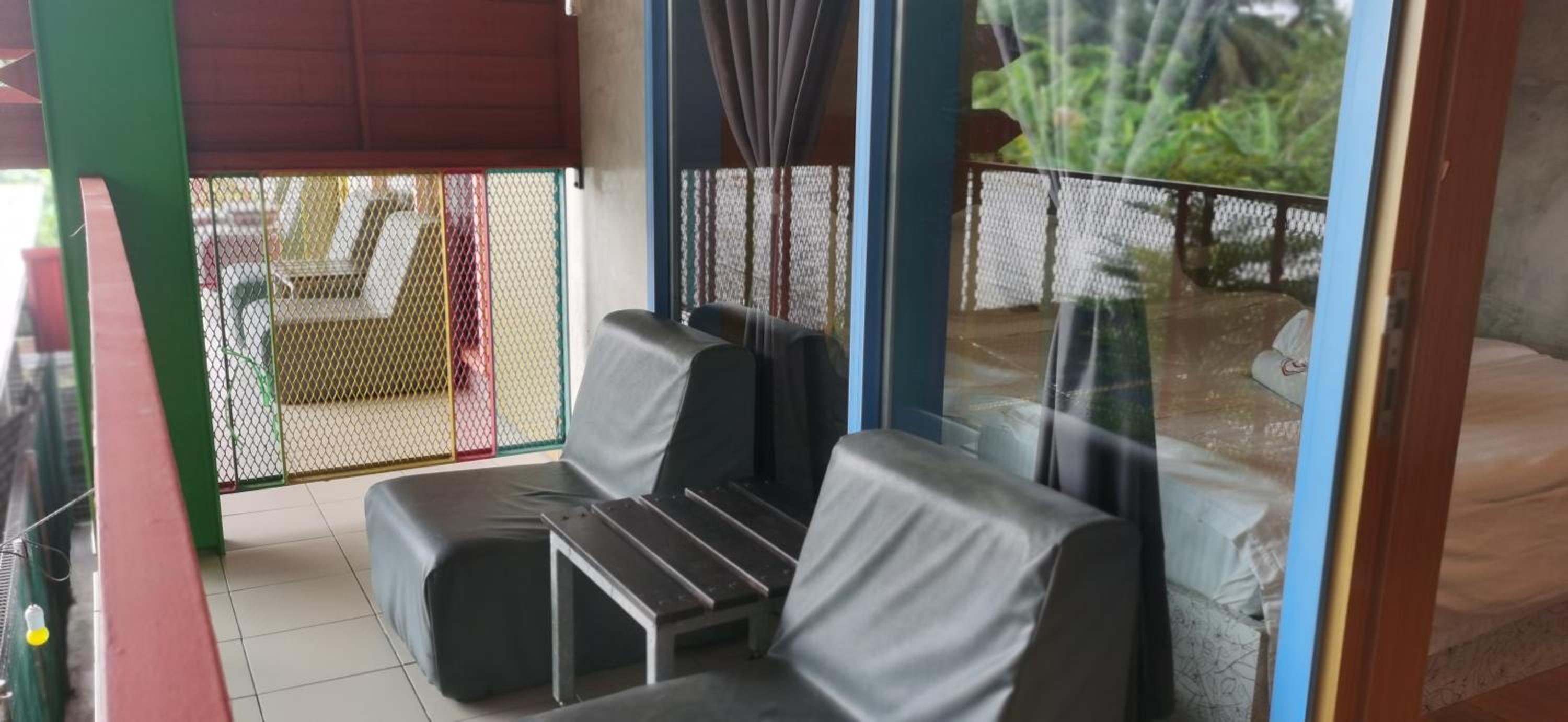 Deluxe King Room with Balcony - Photo 7