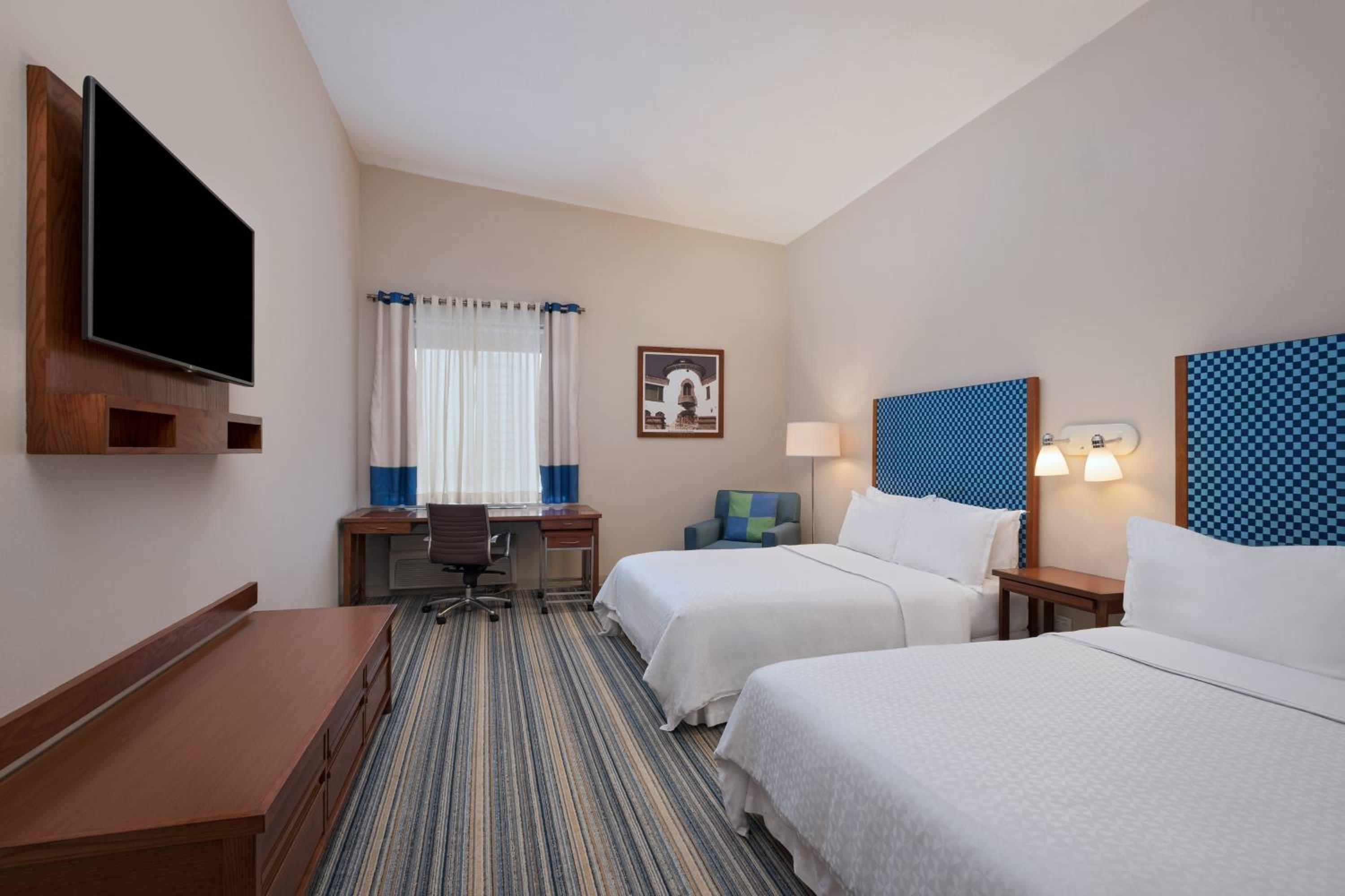 Deluxe Queen Room with Two Queen Beds - Photo 1