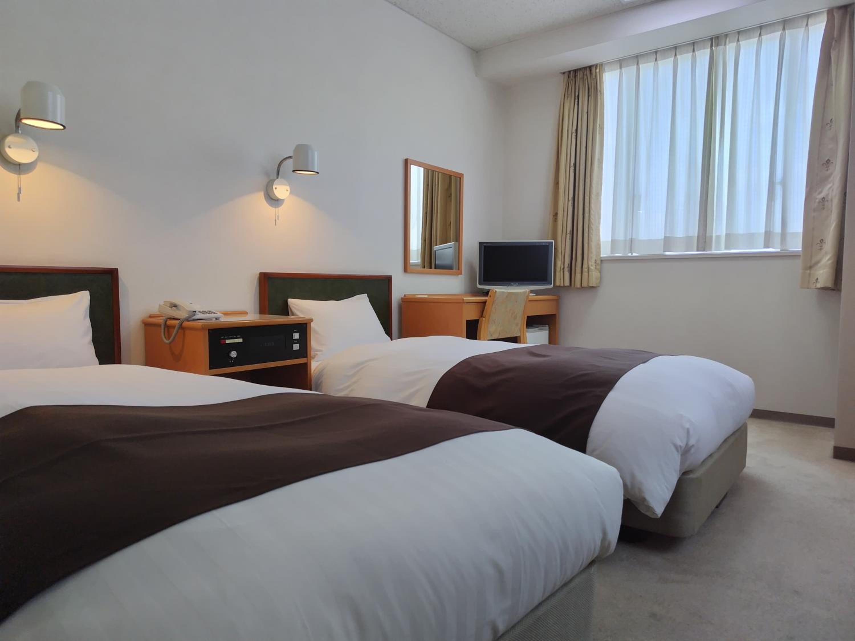 Twin Room with Bathroom - Photo 1