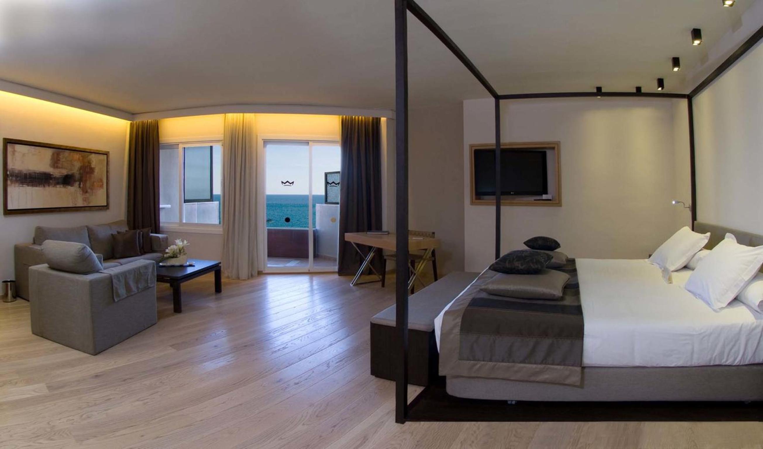Suite Junior con vista al mar y acceso al spa.