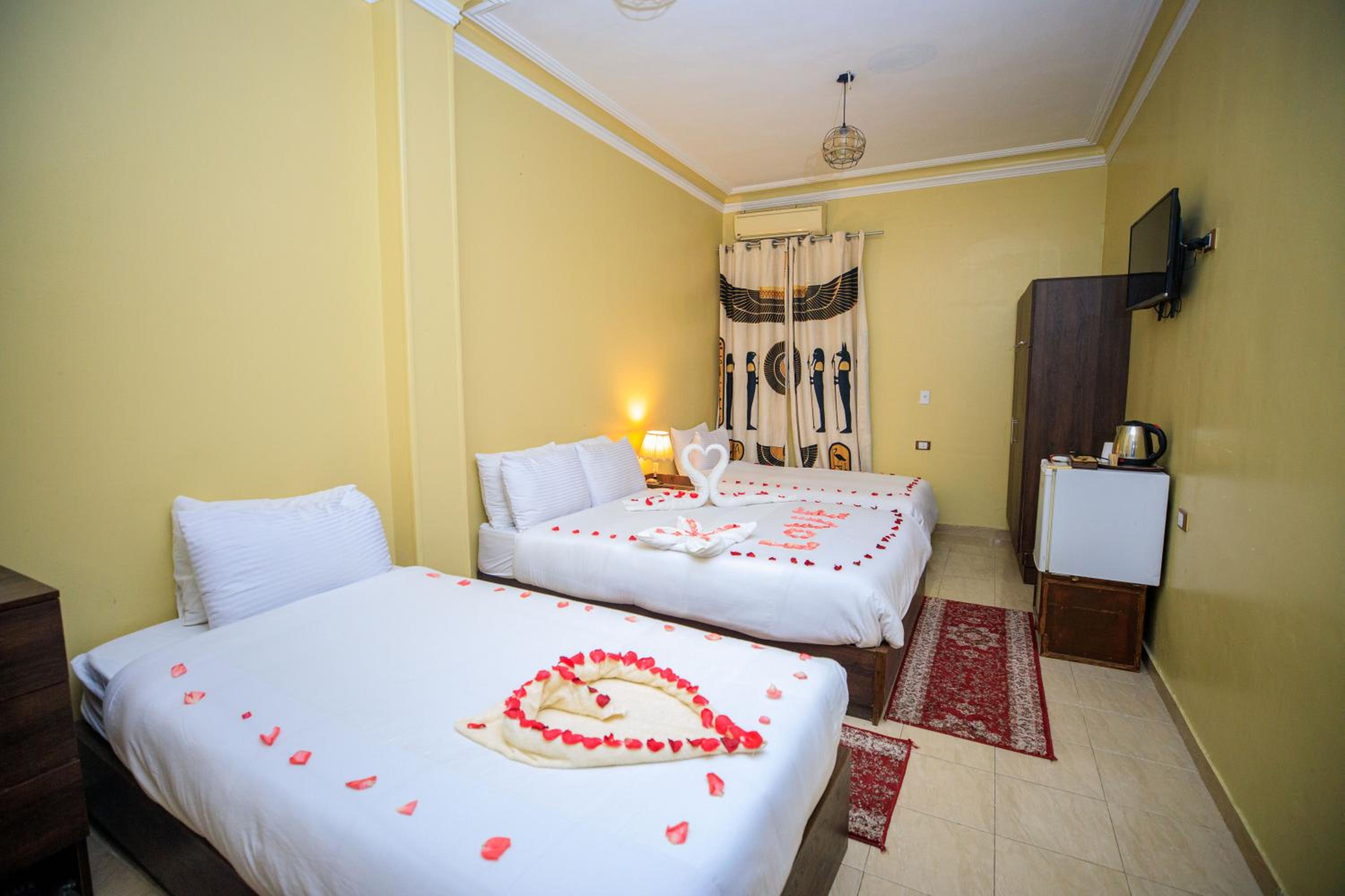 Deluxe Quadruple Room - Photo 4