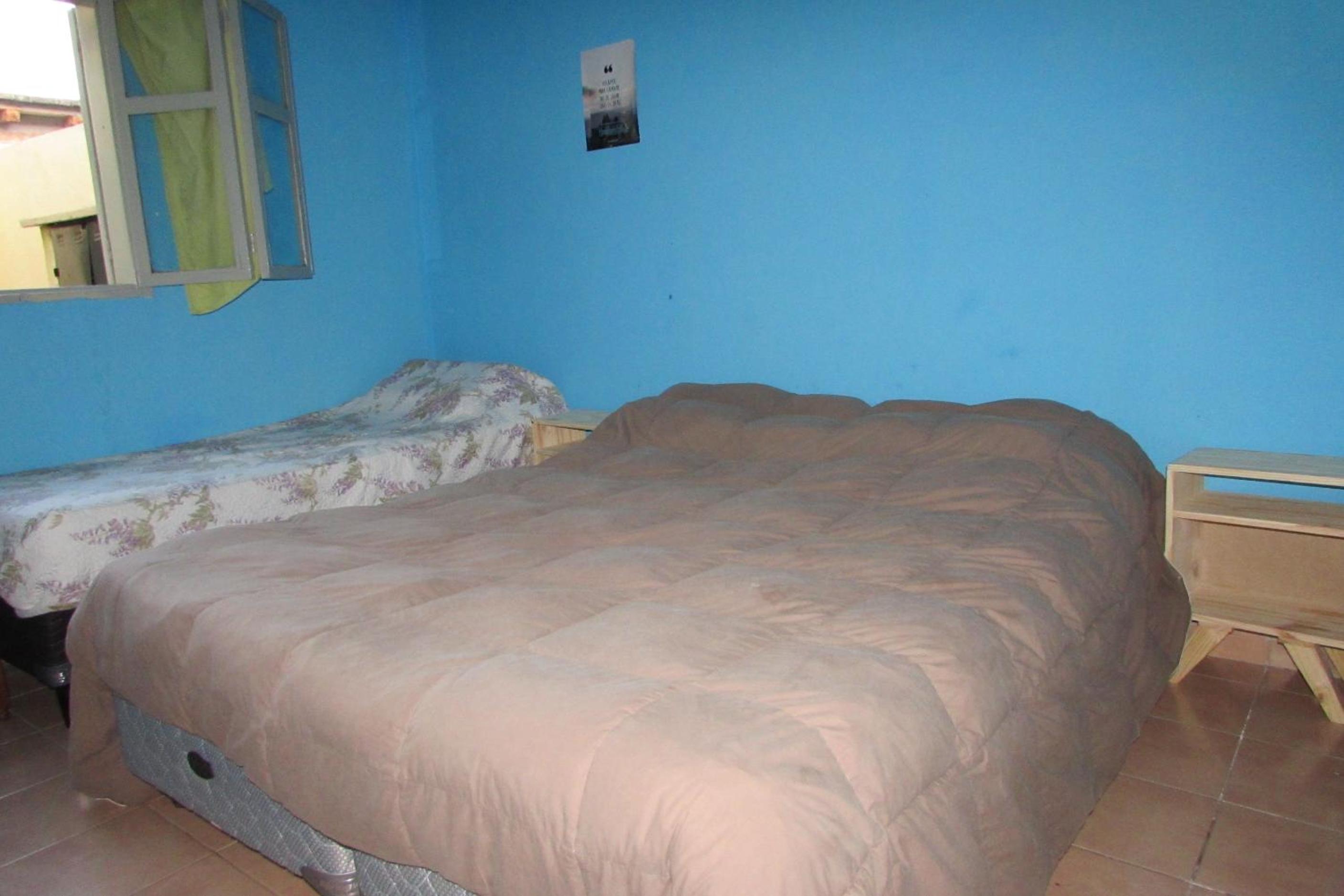 Economy Triple Room with Shared Bathroom photo 2