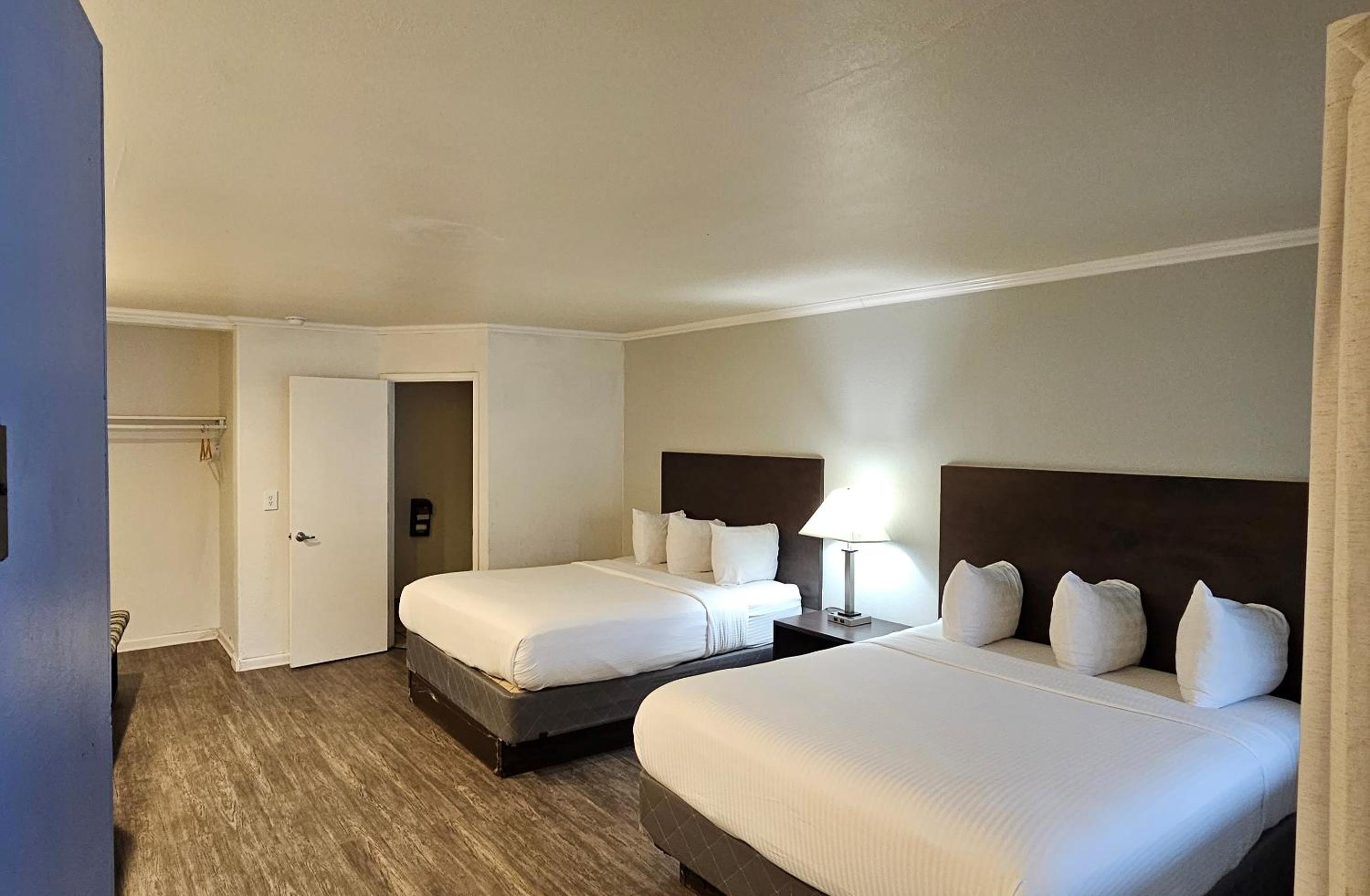 Queen Room with Two Queen Beds - Photo 1