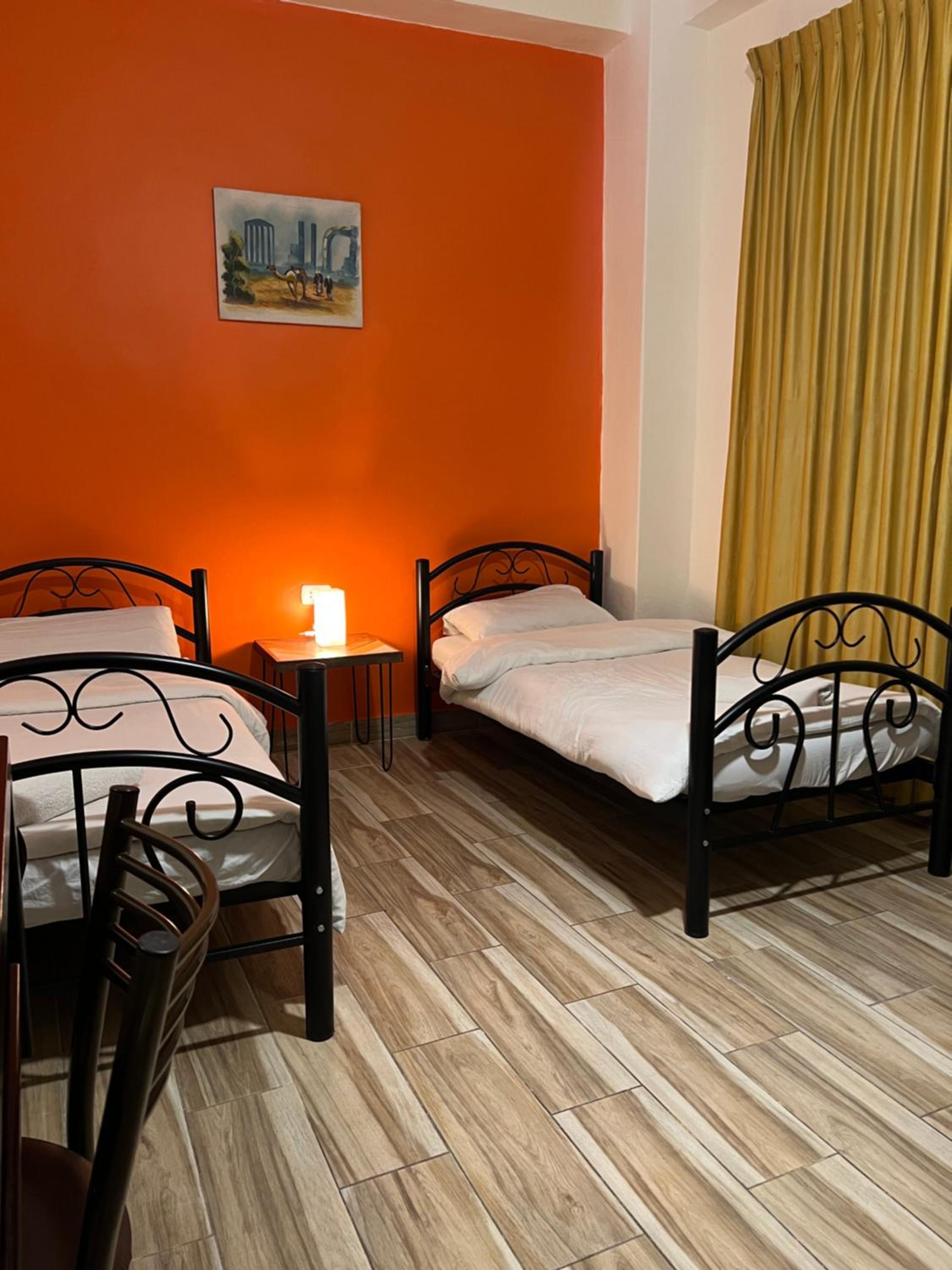 Economy Quadruple Room - Photo 7