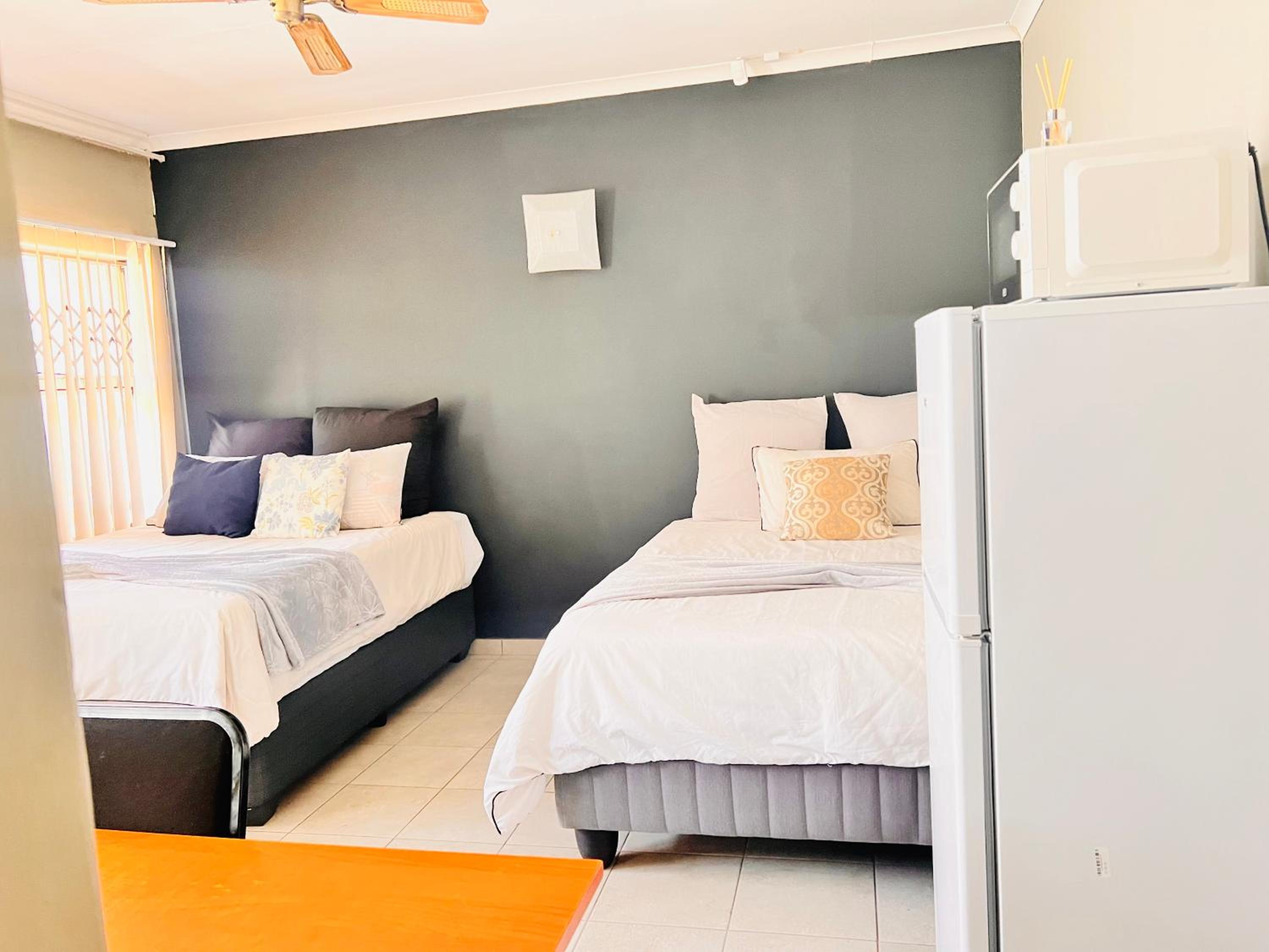 Deluxe Double Room (2 Adults + 1 Child) photo 3