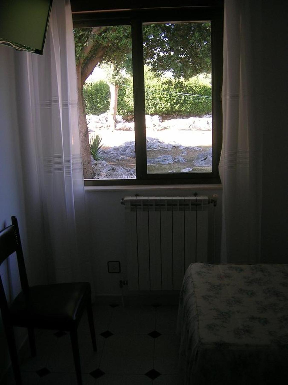 Triple Room with Garden View photo 2