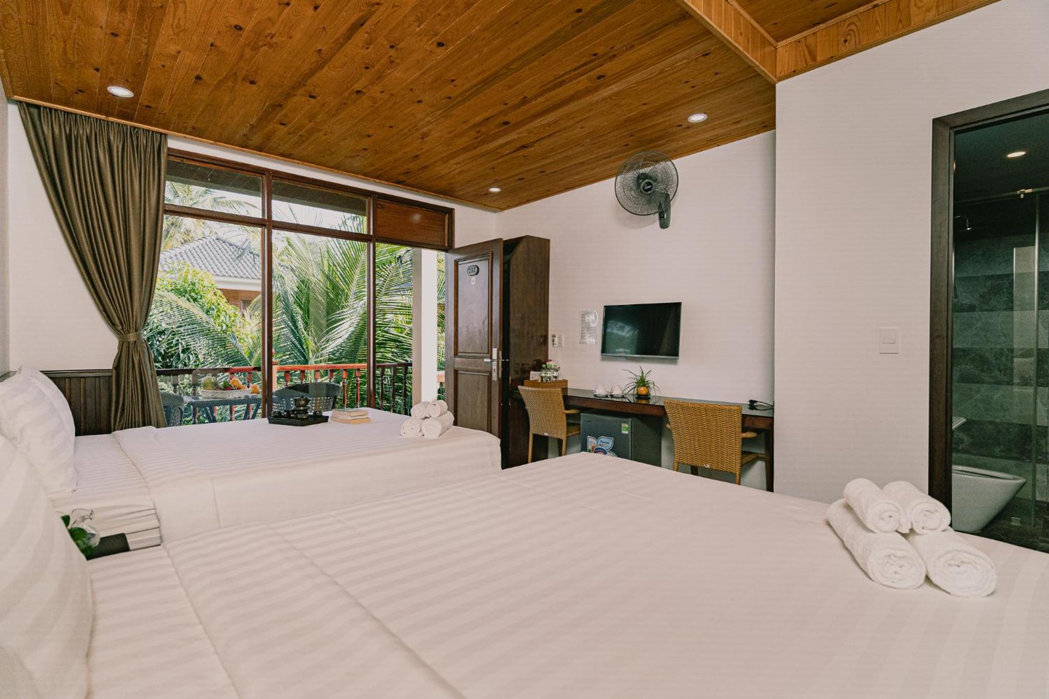 Deluxe Family Suite - Photo 3
