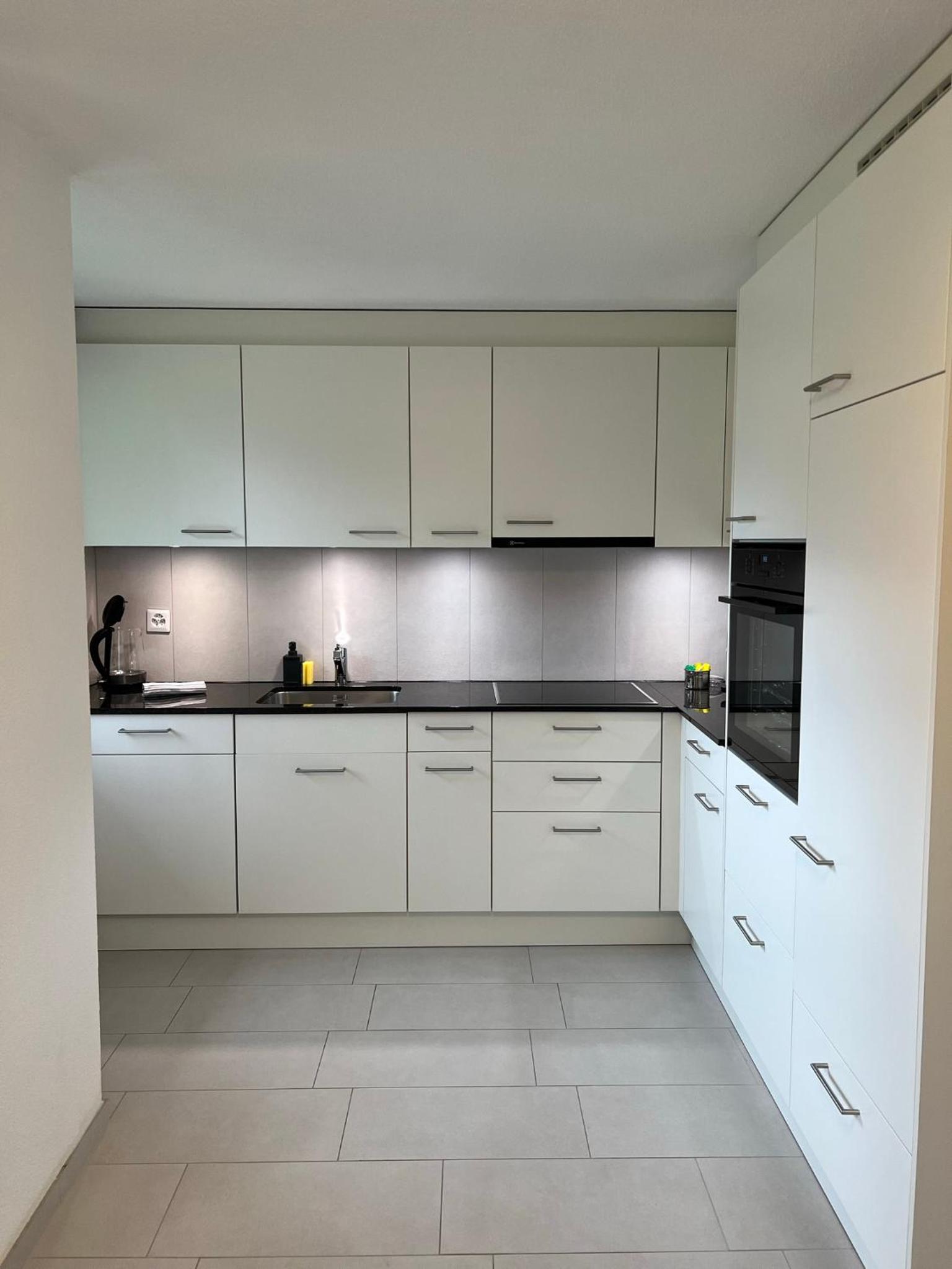 Three-Bedroom Apartment - Photo 14
