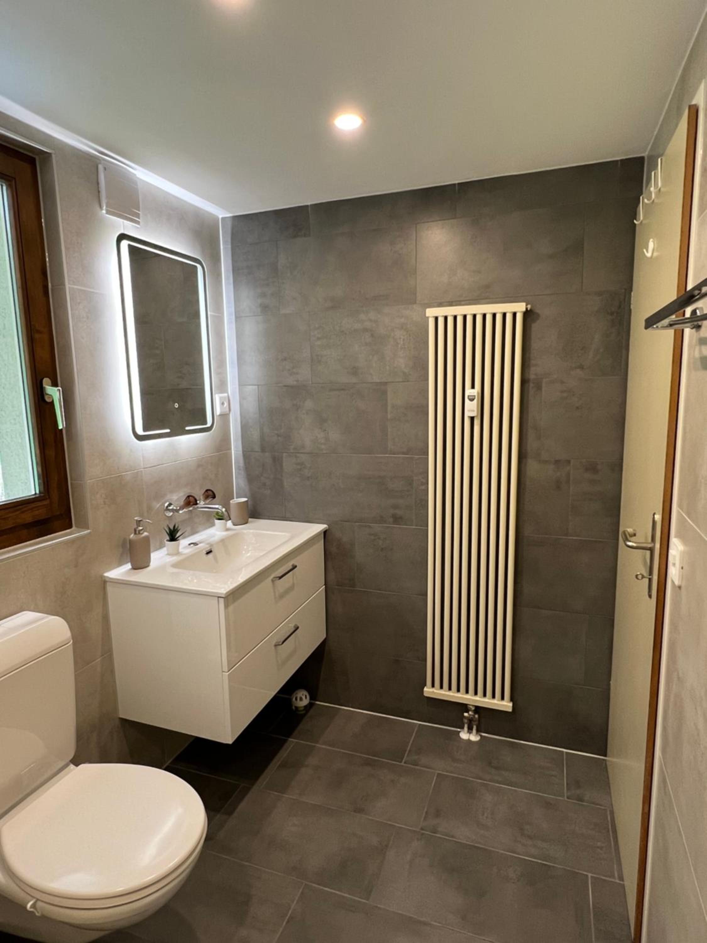 Three-Bedroom Apartment - Photo 18