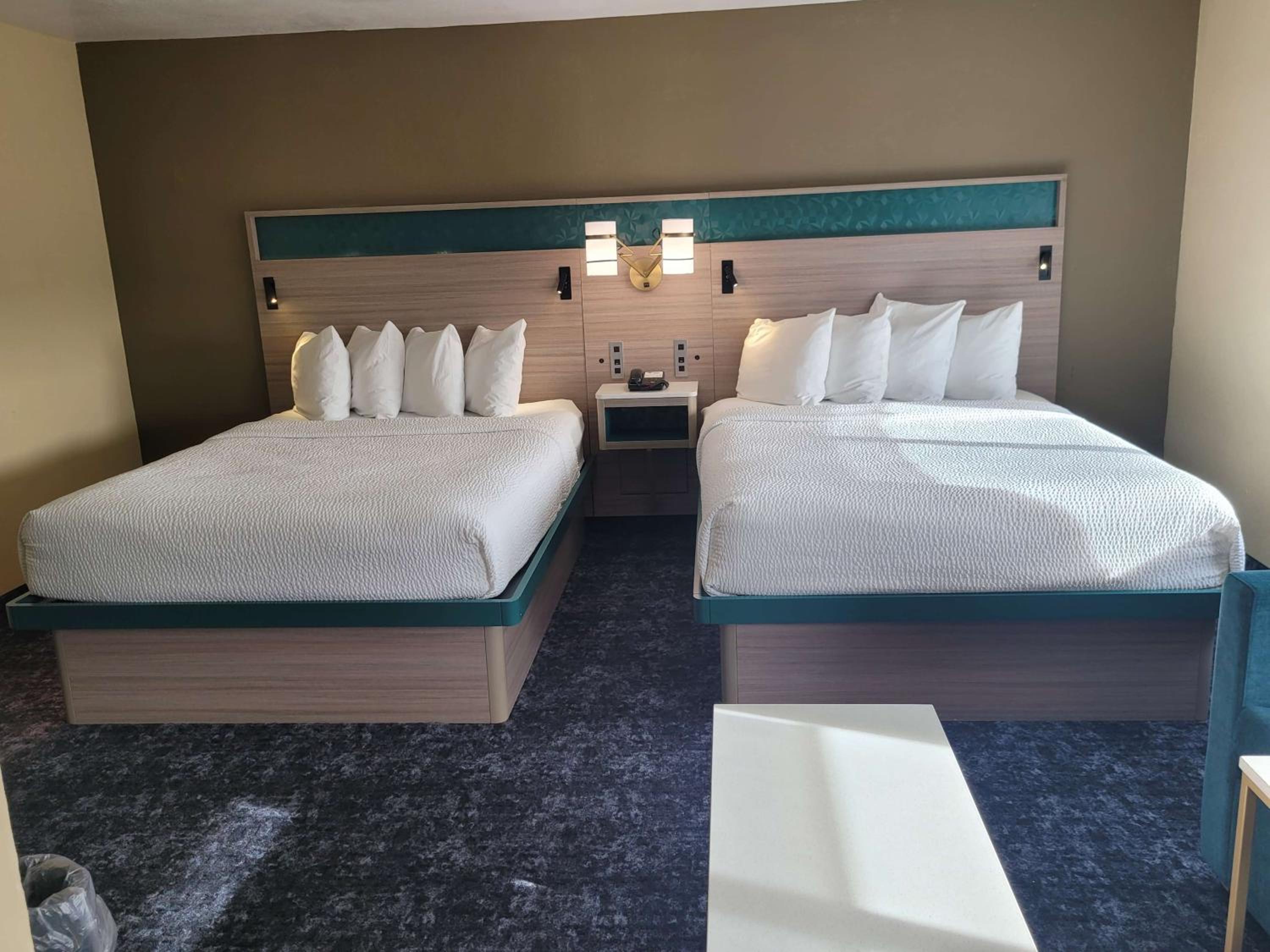 Queen Room with Two Queen Beds and Sofa Bed - Non-Smoking photo 1