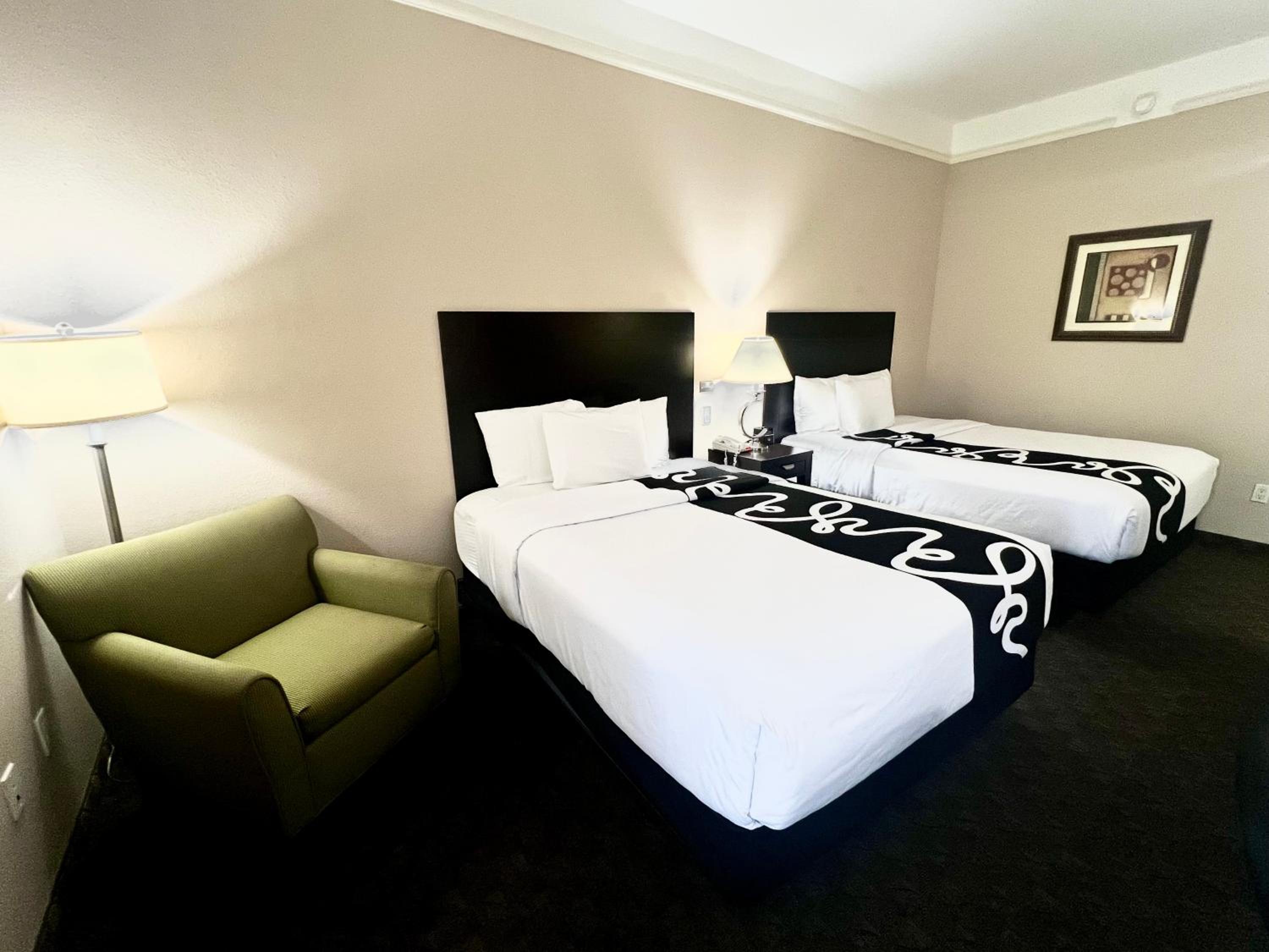 Deluxe Queen Room with Two Queen Beds - Photo 1