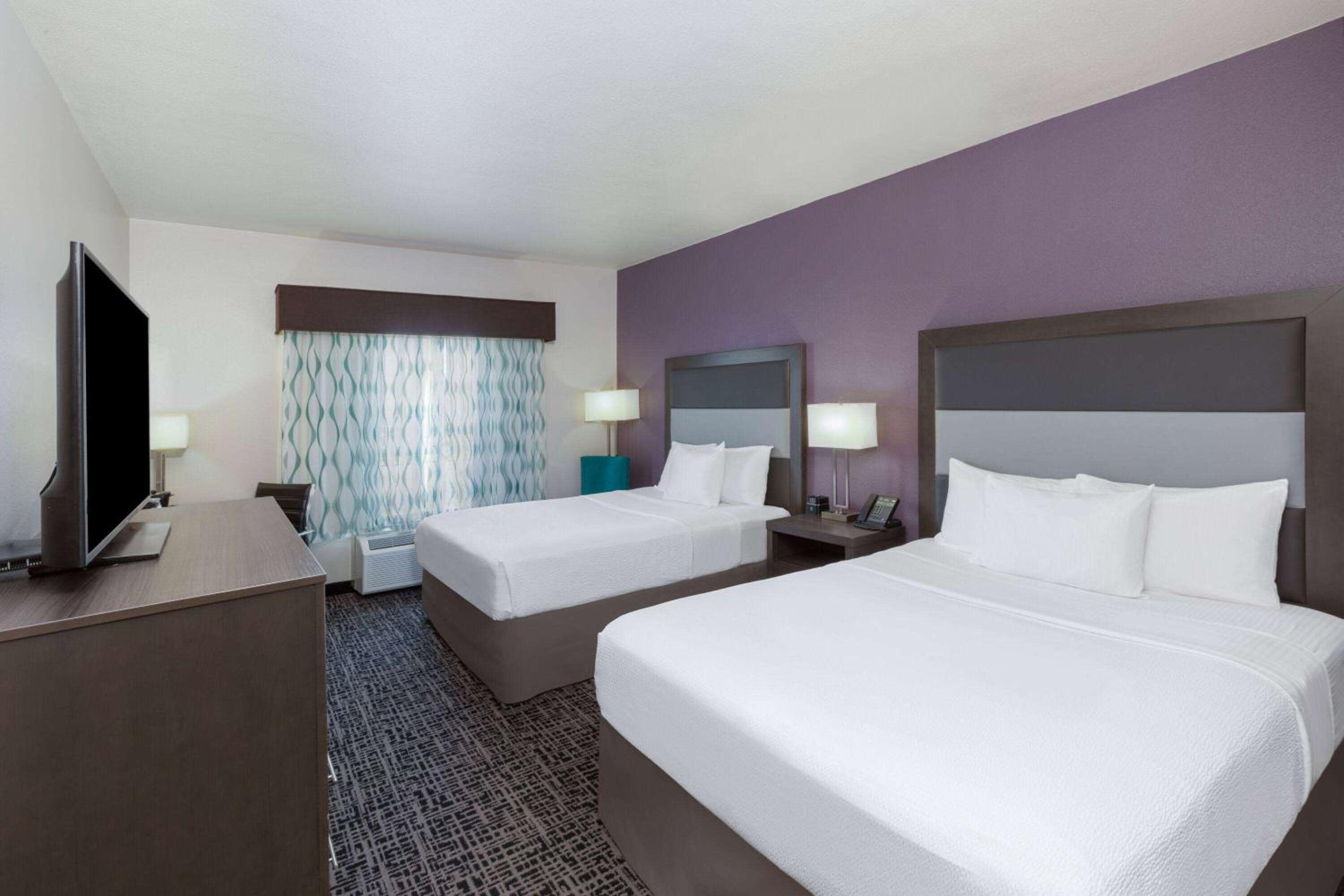 Queen Room with Two Queen Beds - Photo 1