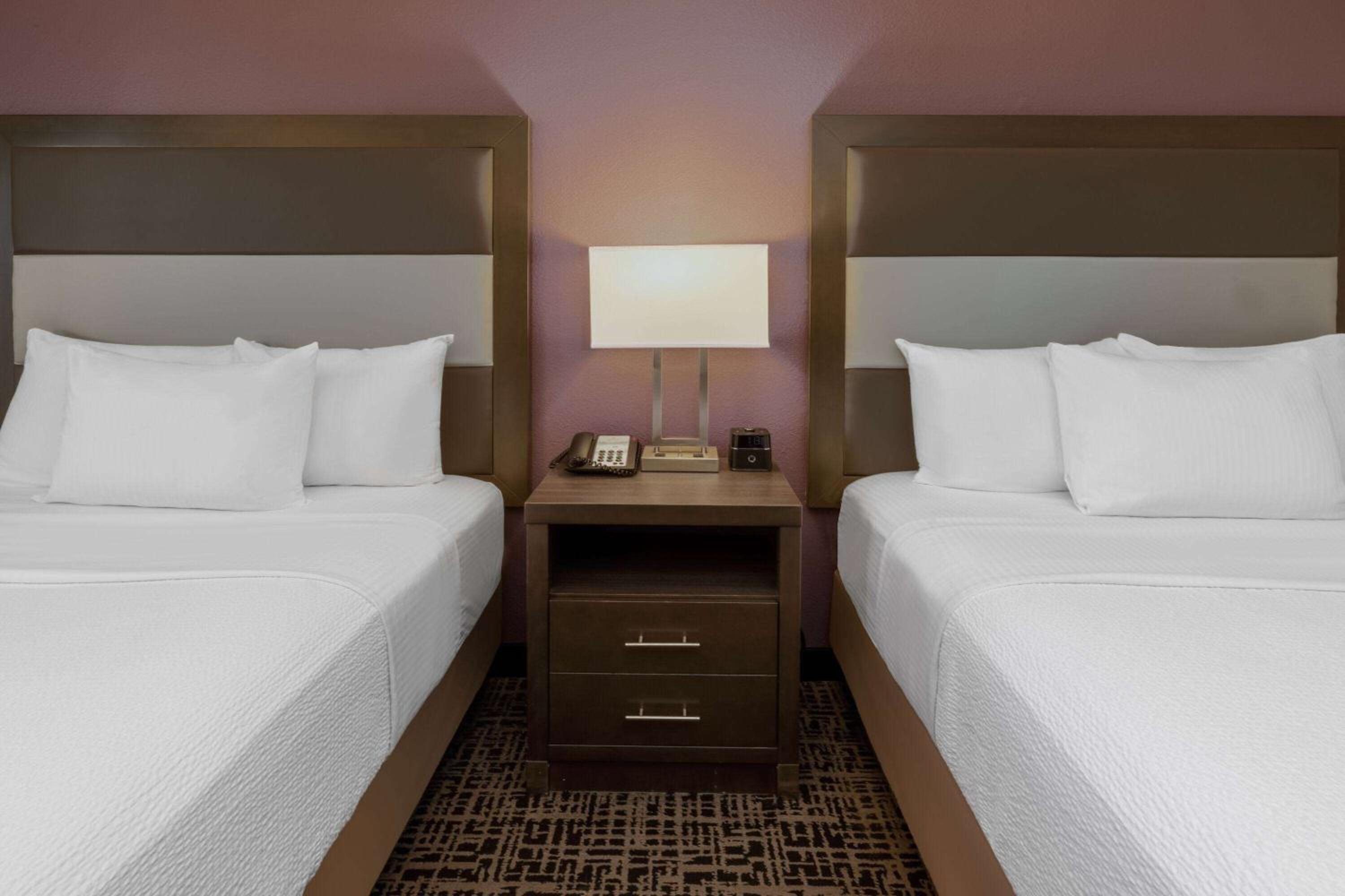 Queen Room with Two Queen Beds - Photo 7