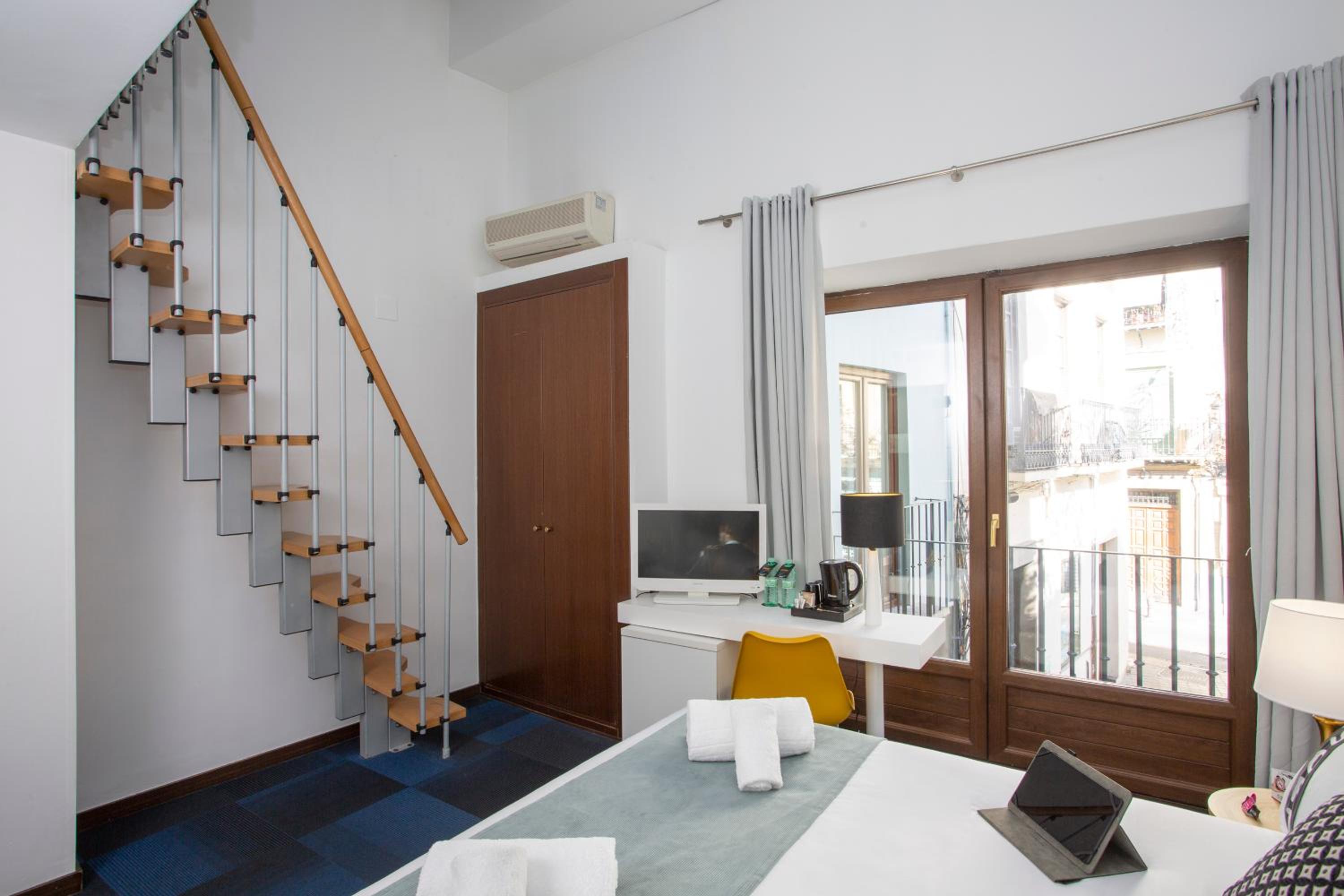 Family Room with Balcony - Photo 1