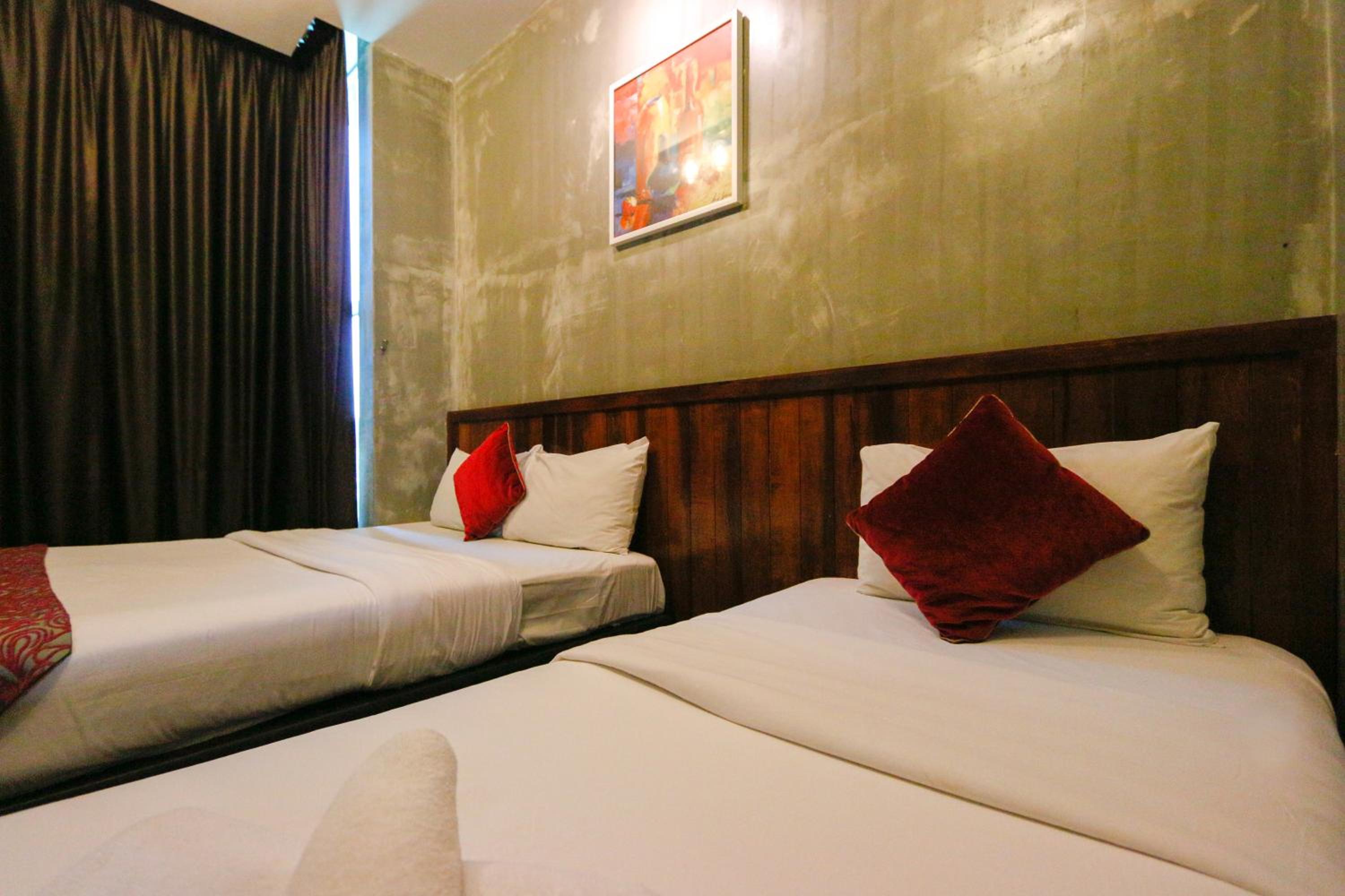 Deluxe Triple Room - Photo 8