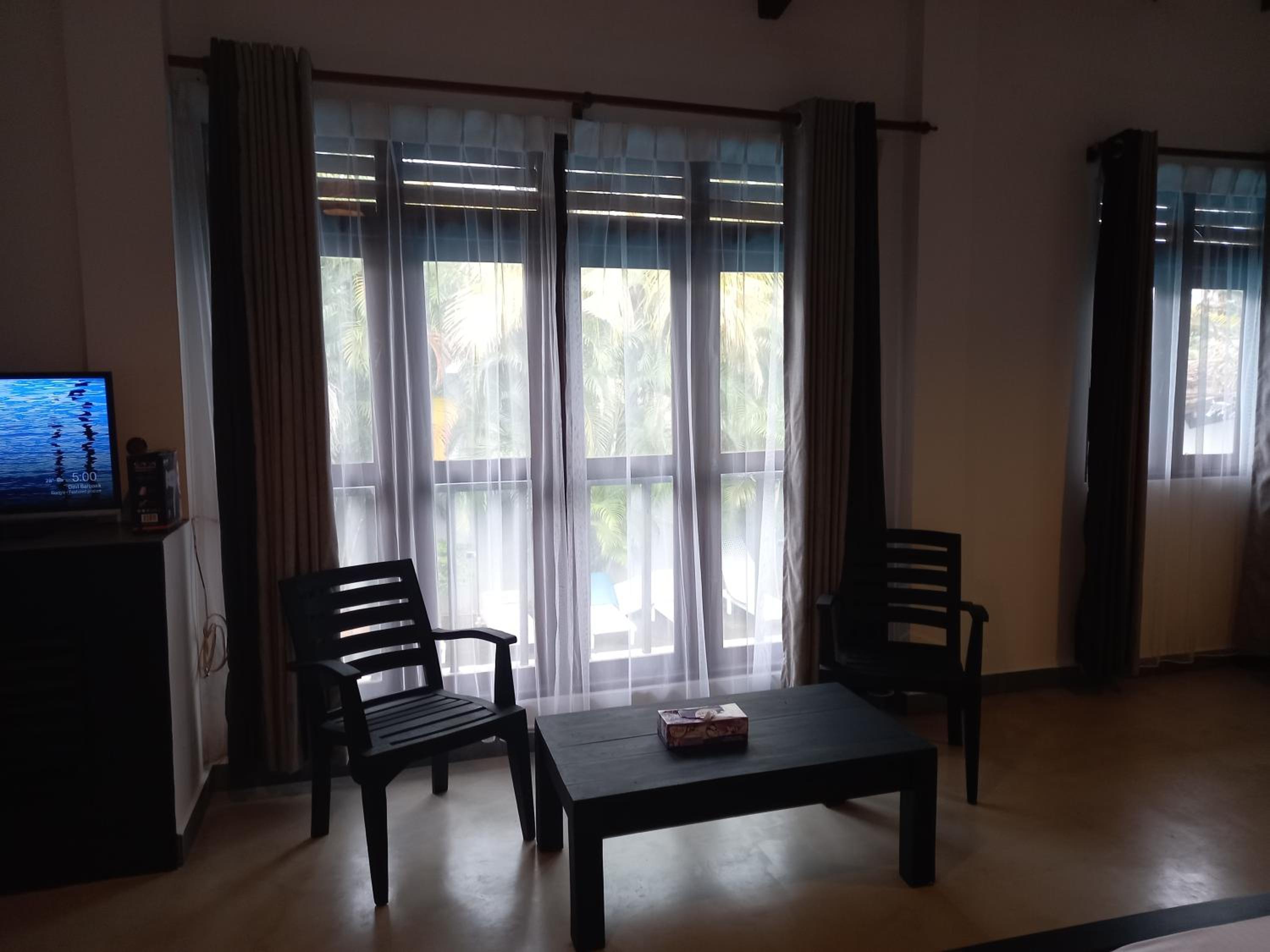 Family Room with Pool View photo 1