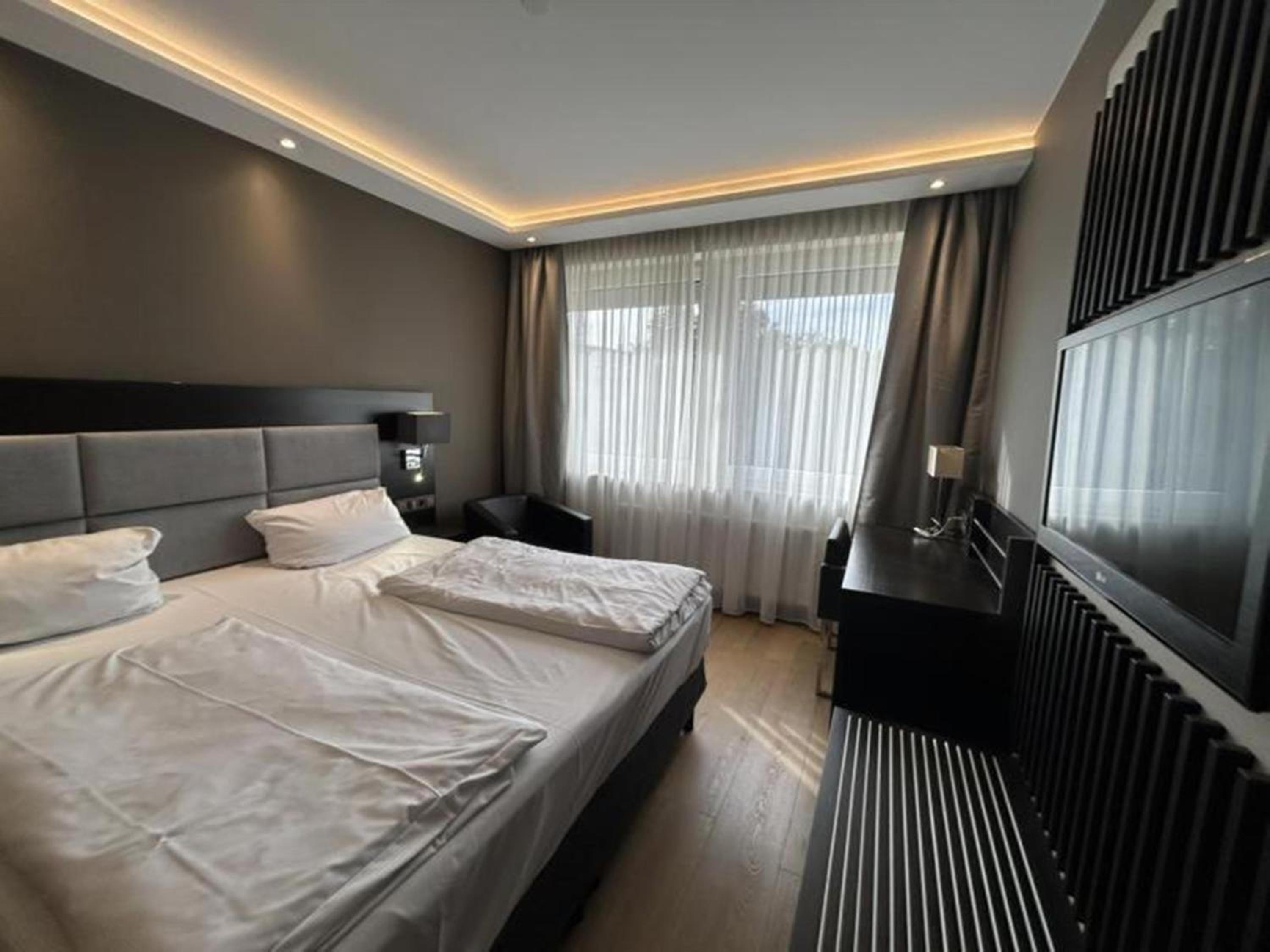 Classic Triple Room - Photo 2