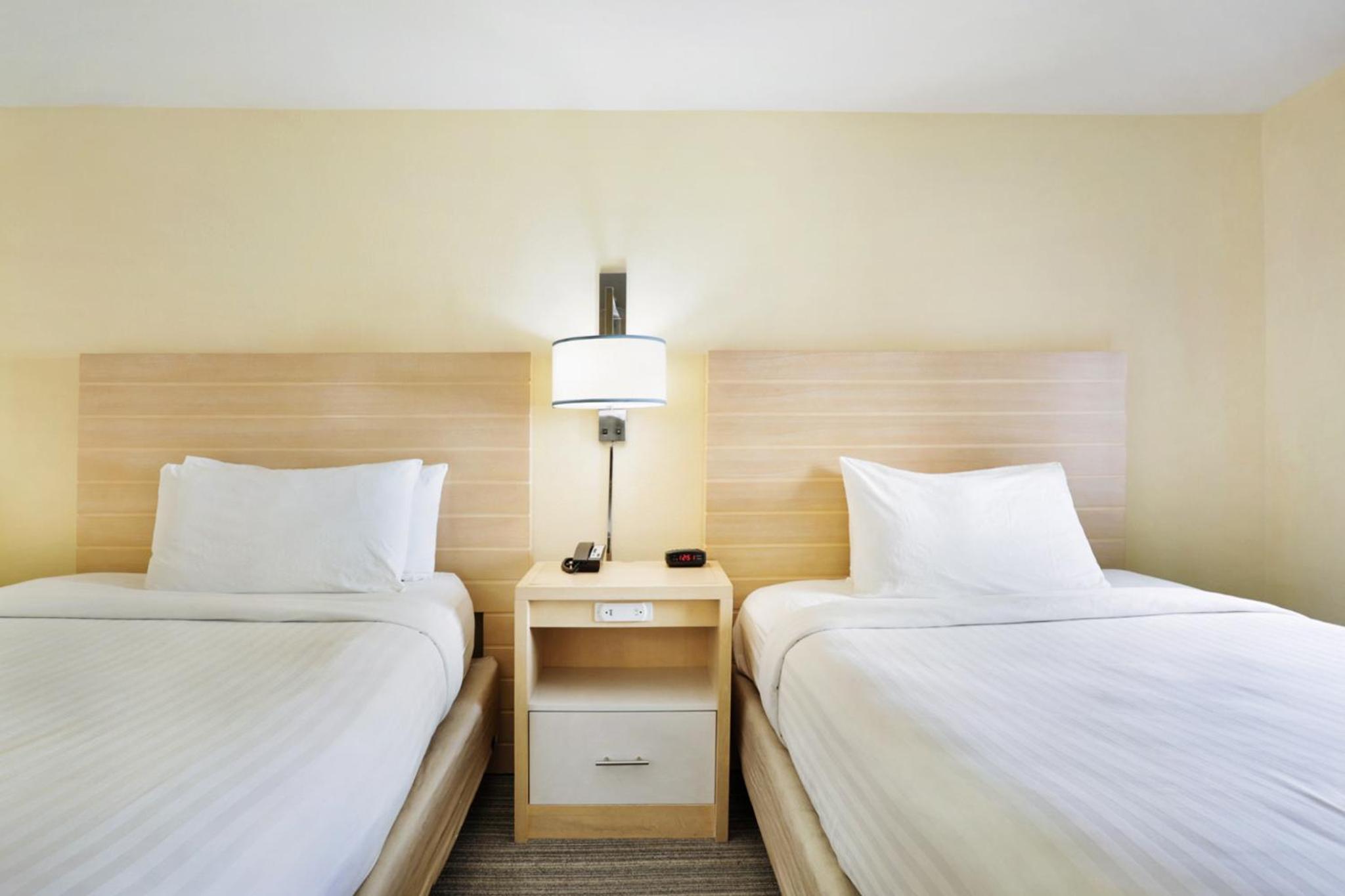 Two-Bedroom Suite with One King Bed and Two Queen Beds - Photo 1