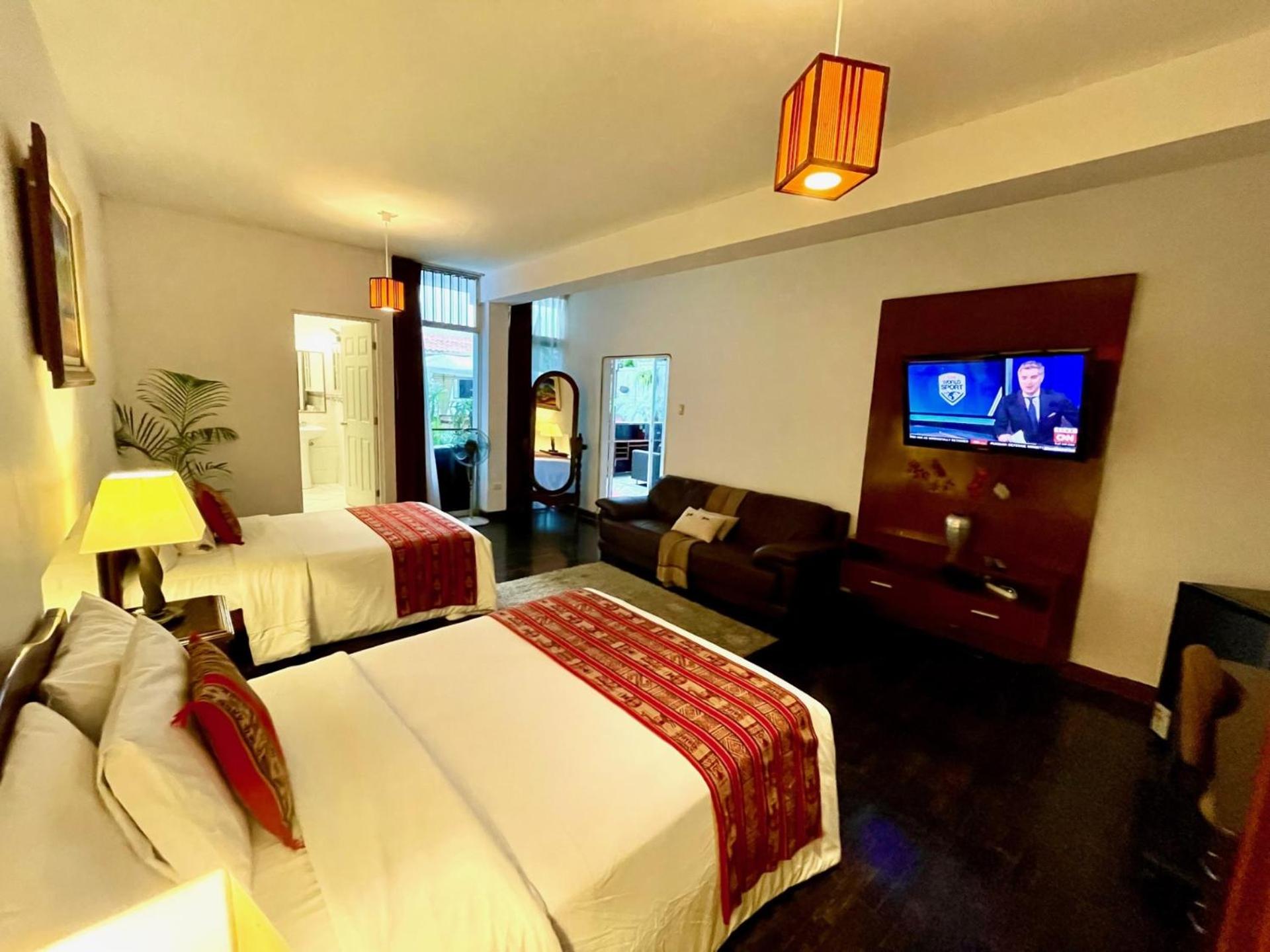 Quadruple Room - Photo 23