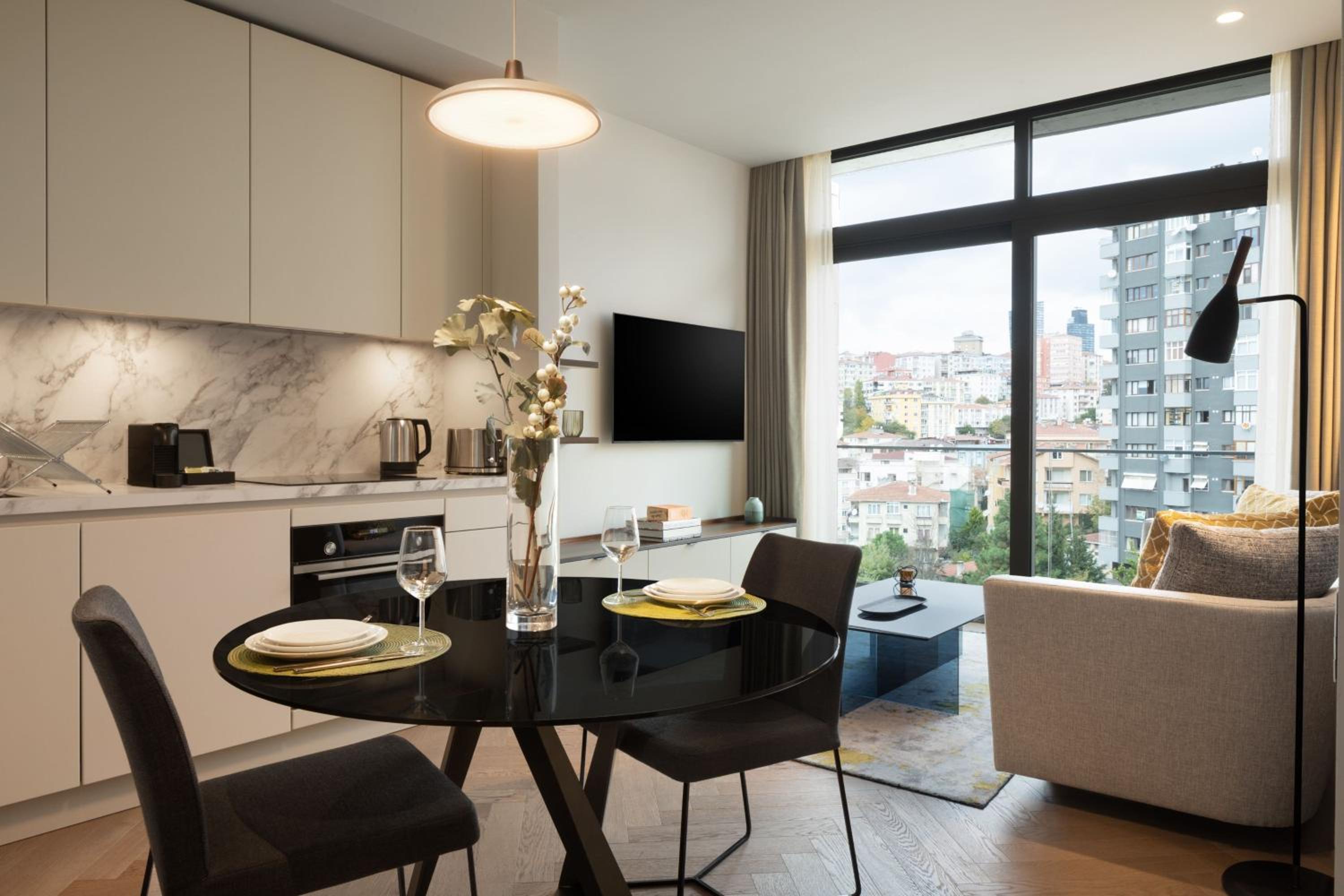 One Bedroom Larger Apartment with Balcony and City View