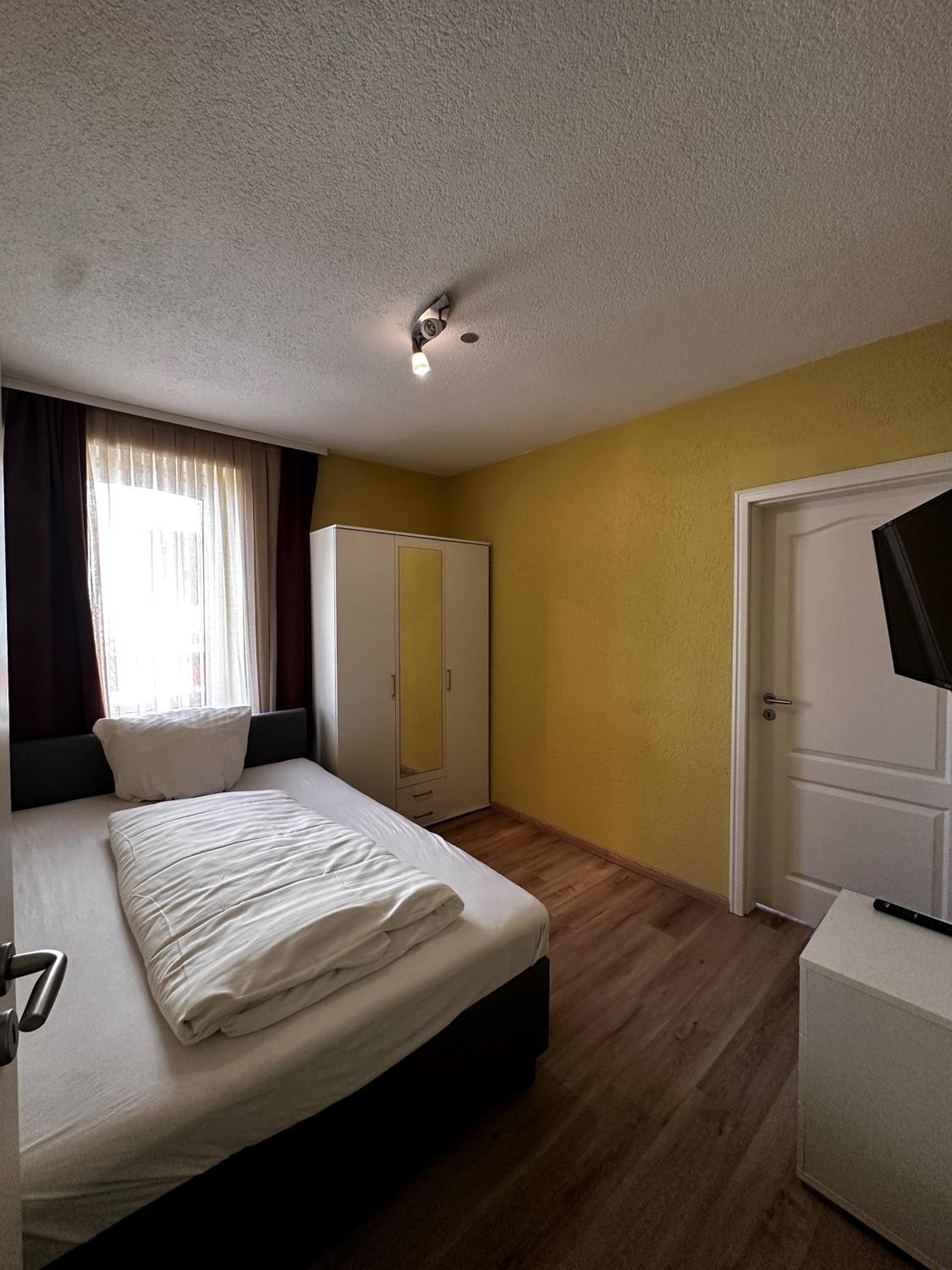 Three-Bedroom Apartment photo 1
