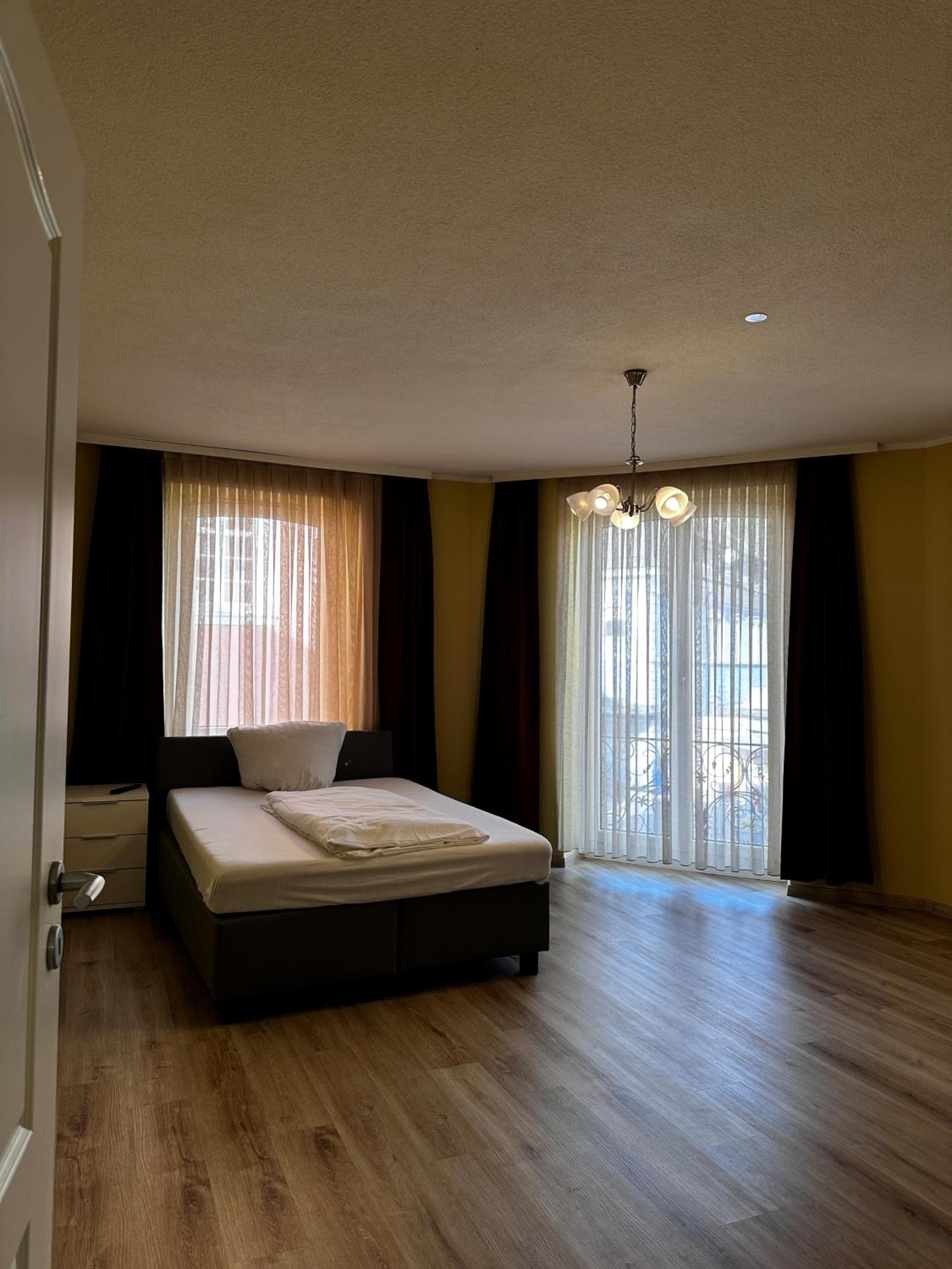 Three-Bedroom Apartment photo 2
