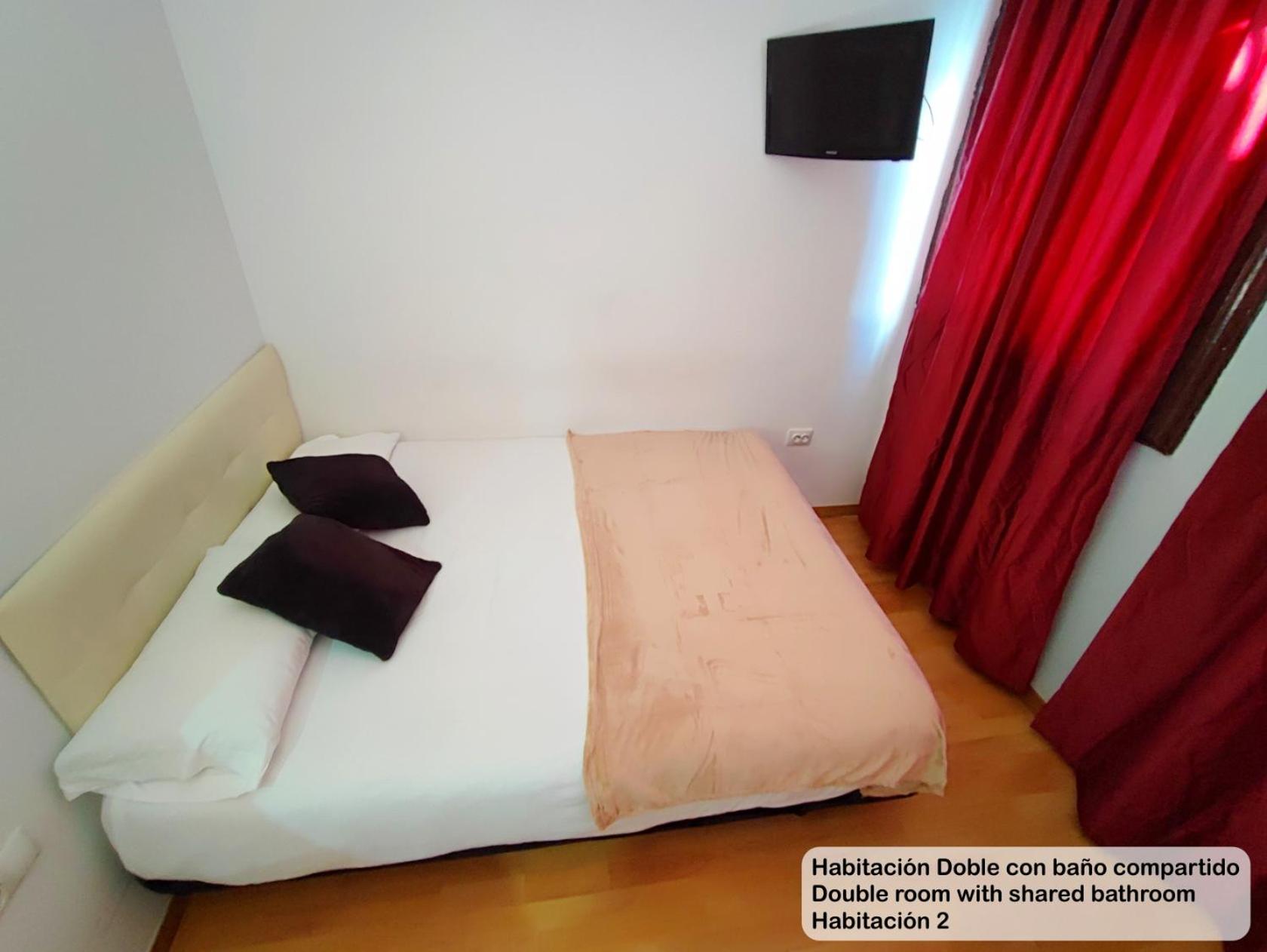 Habitación doble con baño compartido
