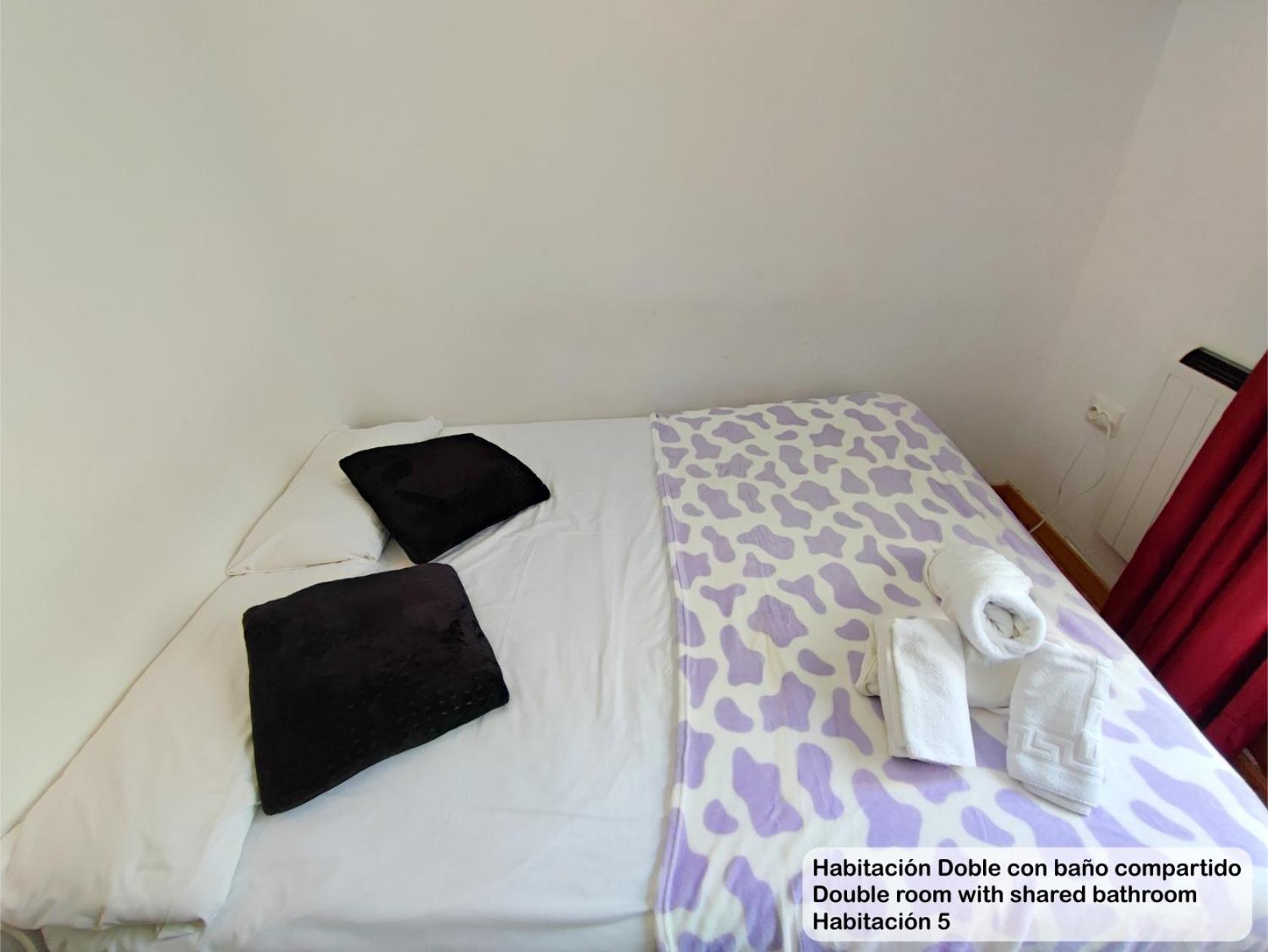 Habitación doble con baño compartido