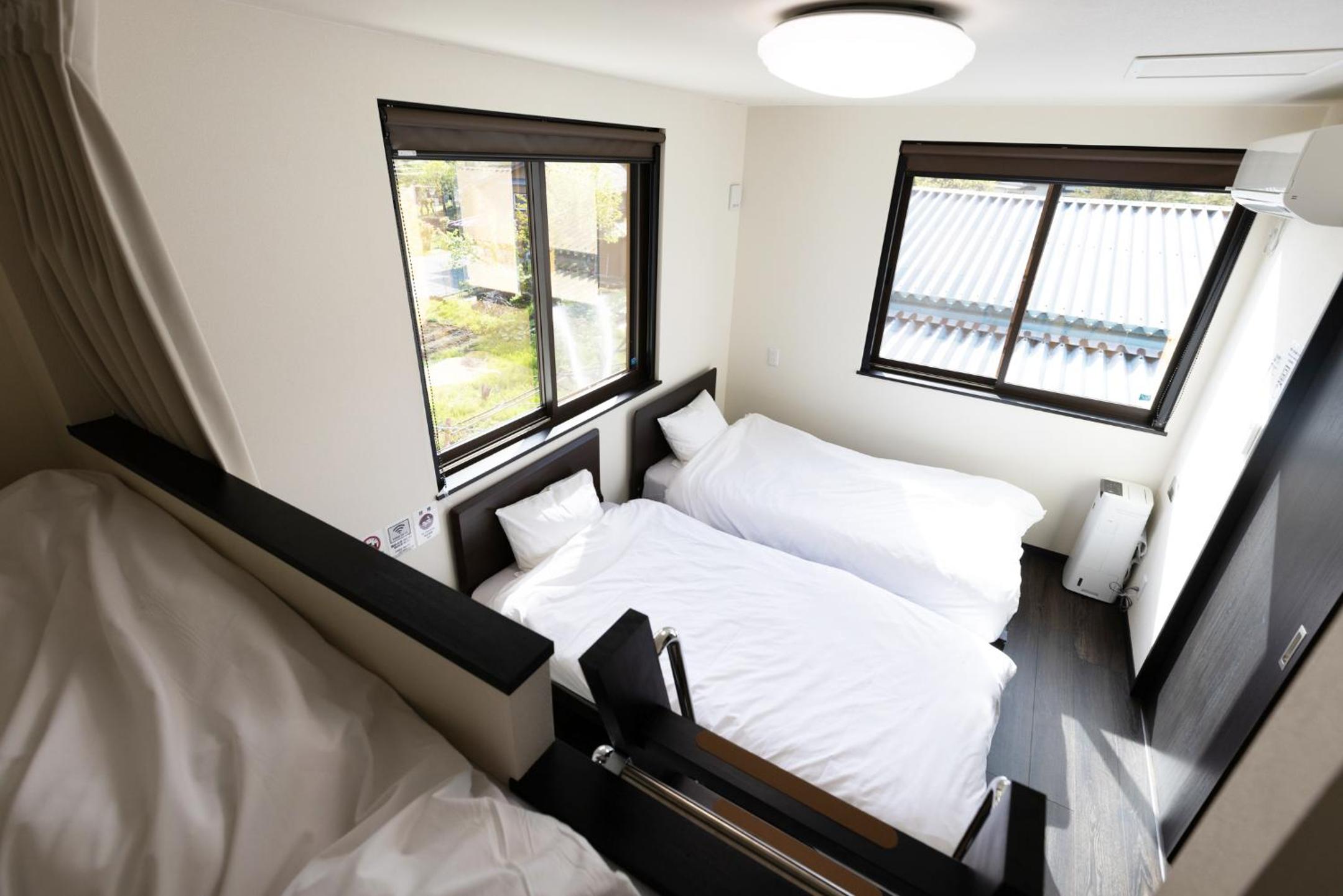 Three-Bedroom House - Photo 27