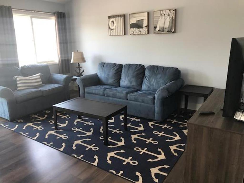 Three-Bedroom Apartment photo 2