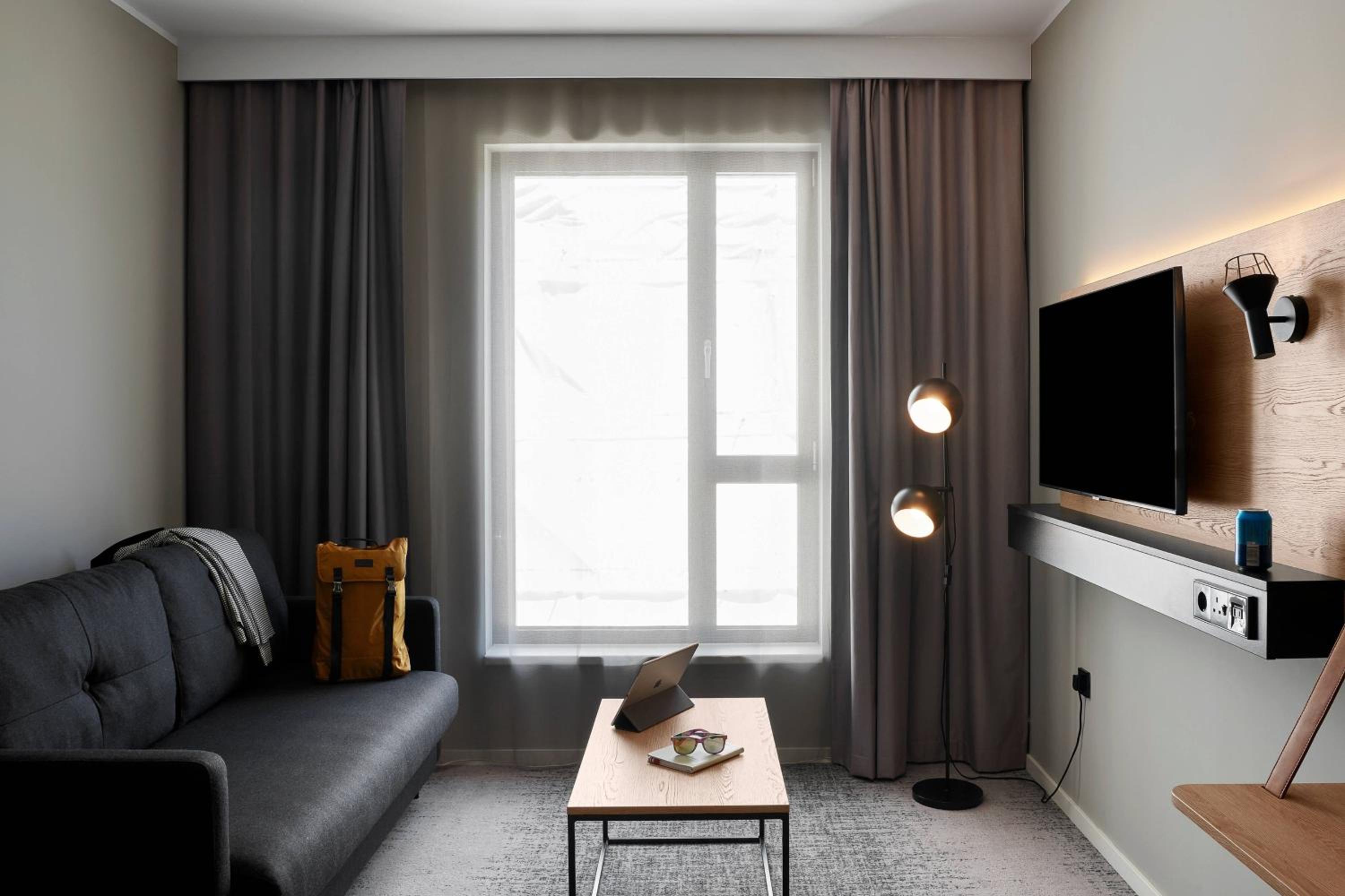 Moxy Extra Sleeper Queen Room with Sofa Bed - Photo 1