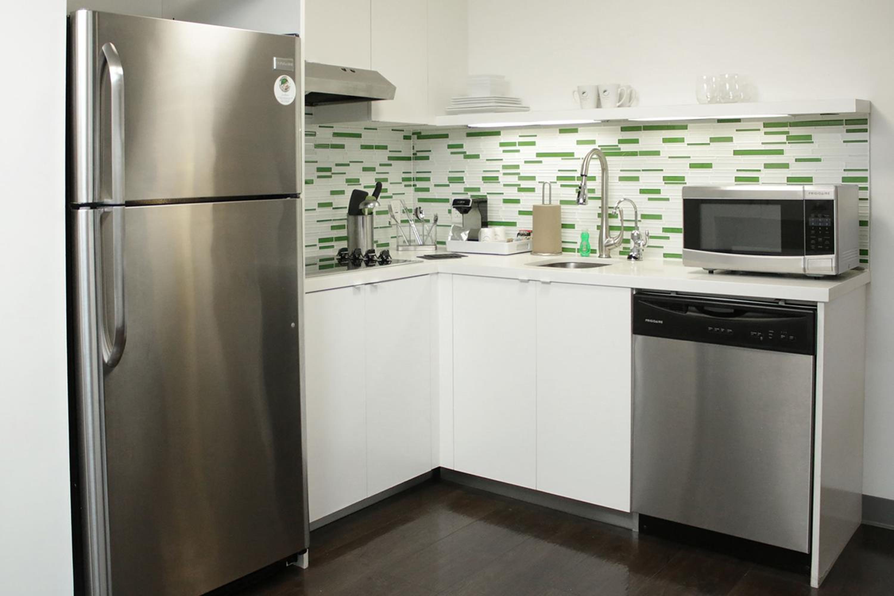 One-Bedroom Large King Suite with Sofa Bed and Roll-In Shower - Mobility and Hearing Accessible photo 3