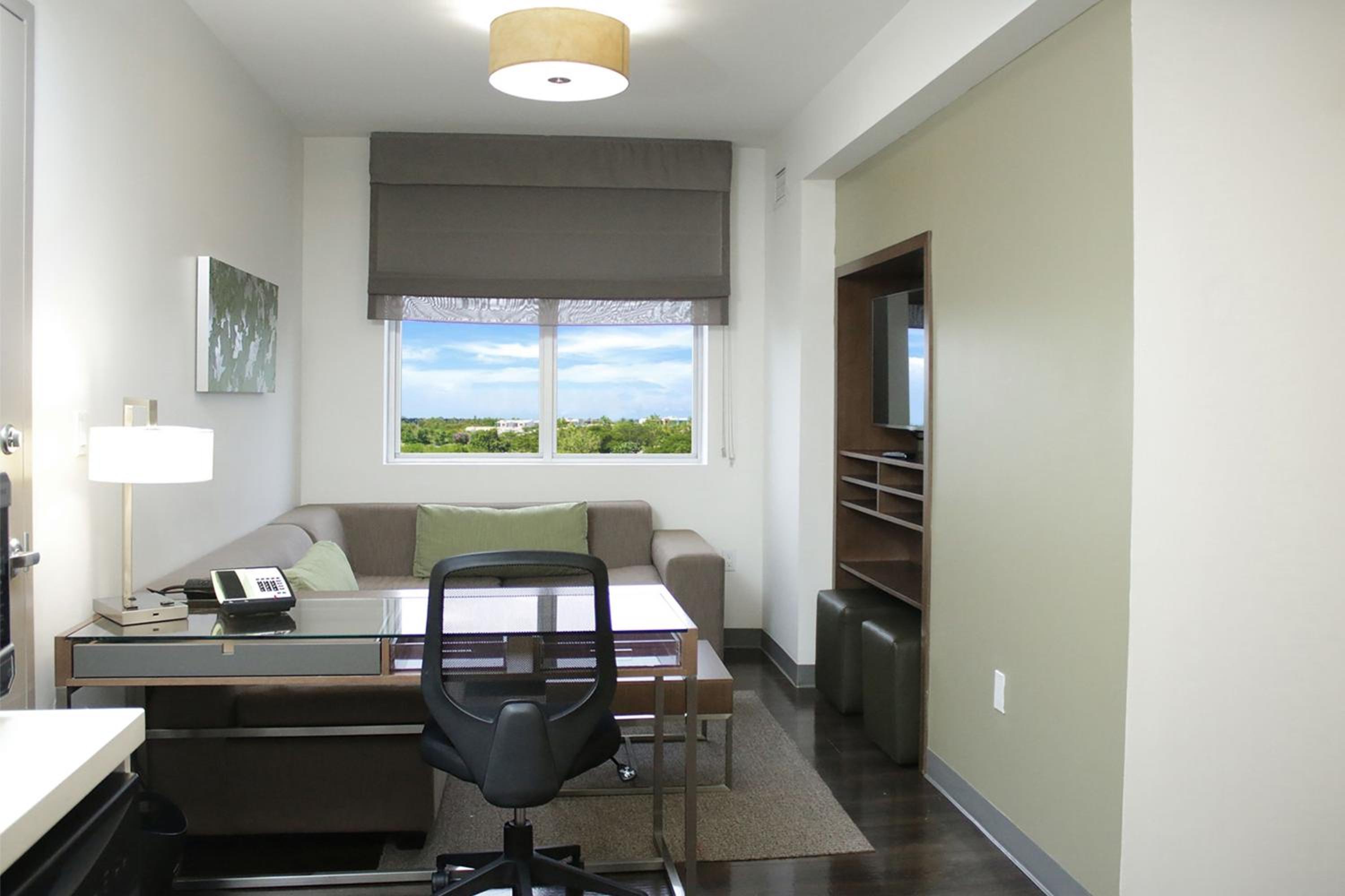 One-Bedroom Large King Suite with Sofa Bed and Roll-In Shower - Mobility and Hearing Accessible