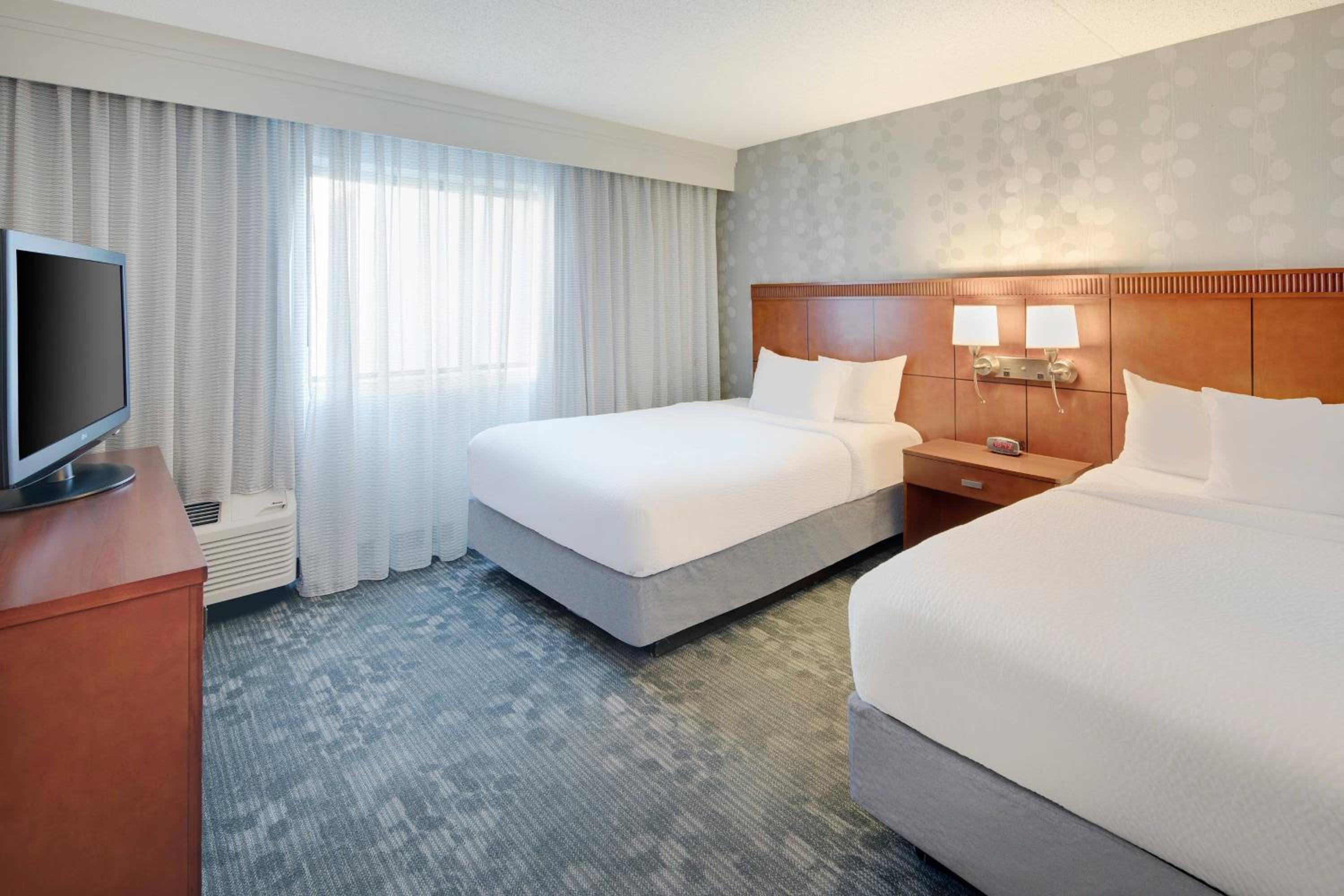 One-Bedroom Queen Suite with Two Queen Beds and Sofa Bed - Photo 1