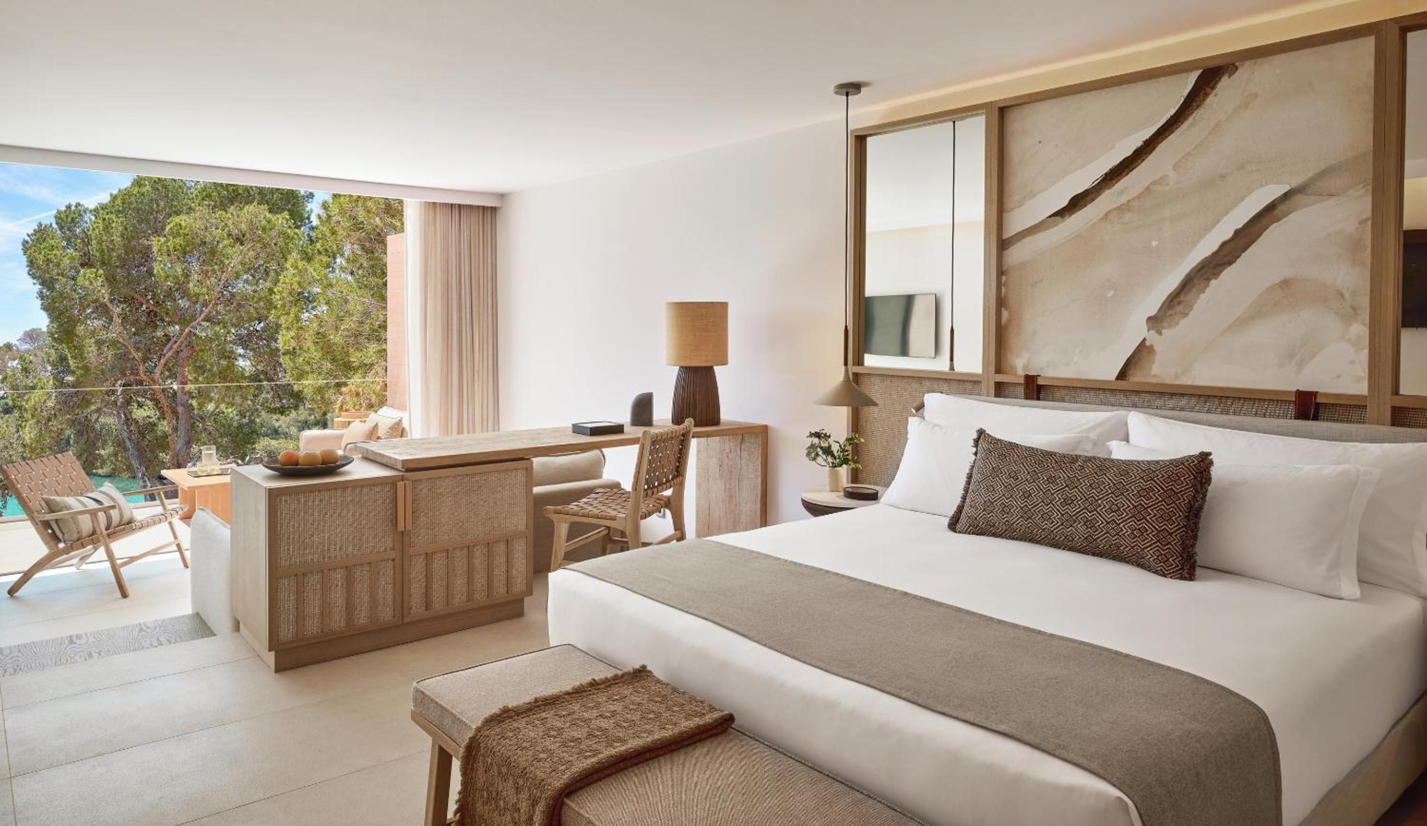 Suite Junior Deluxe con vista parcial al mar